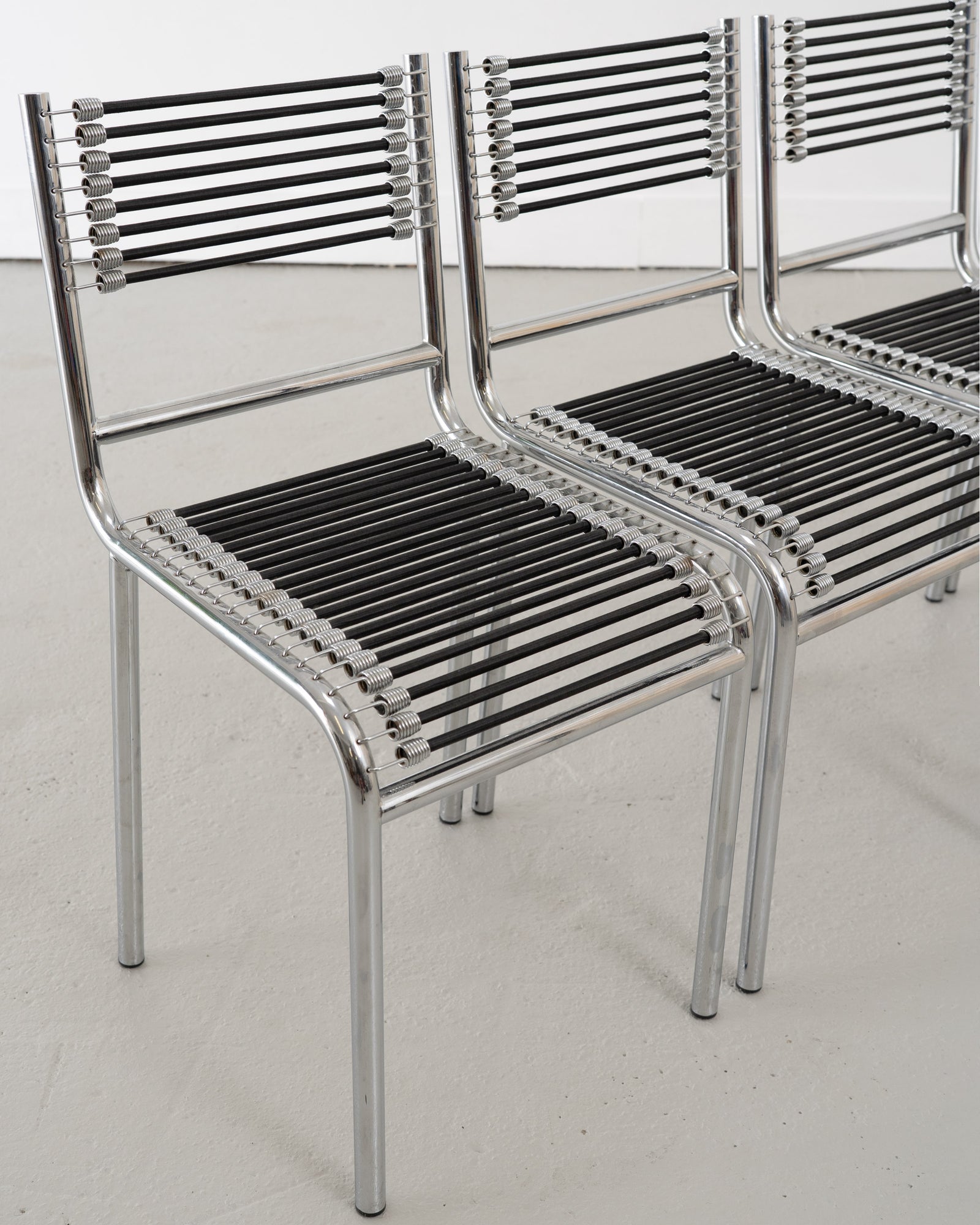 Four Sandows Chairs by René Herbst, c.1980 — lifestyle setting