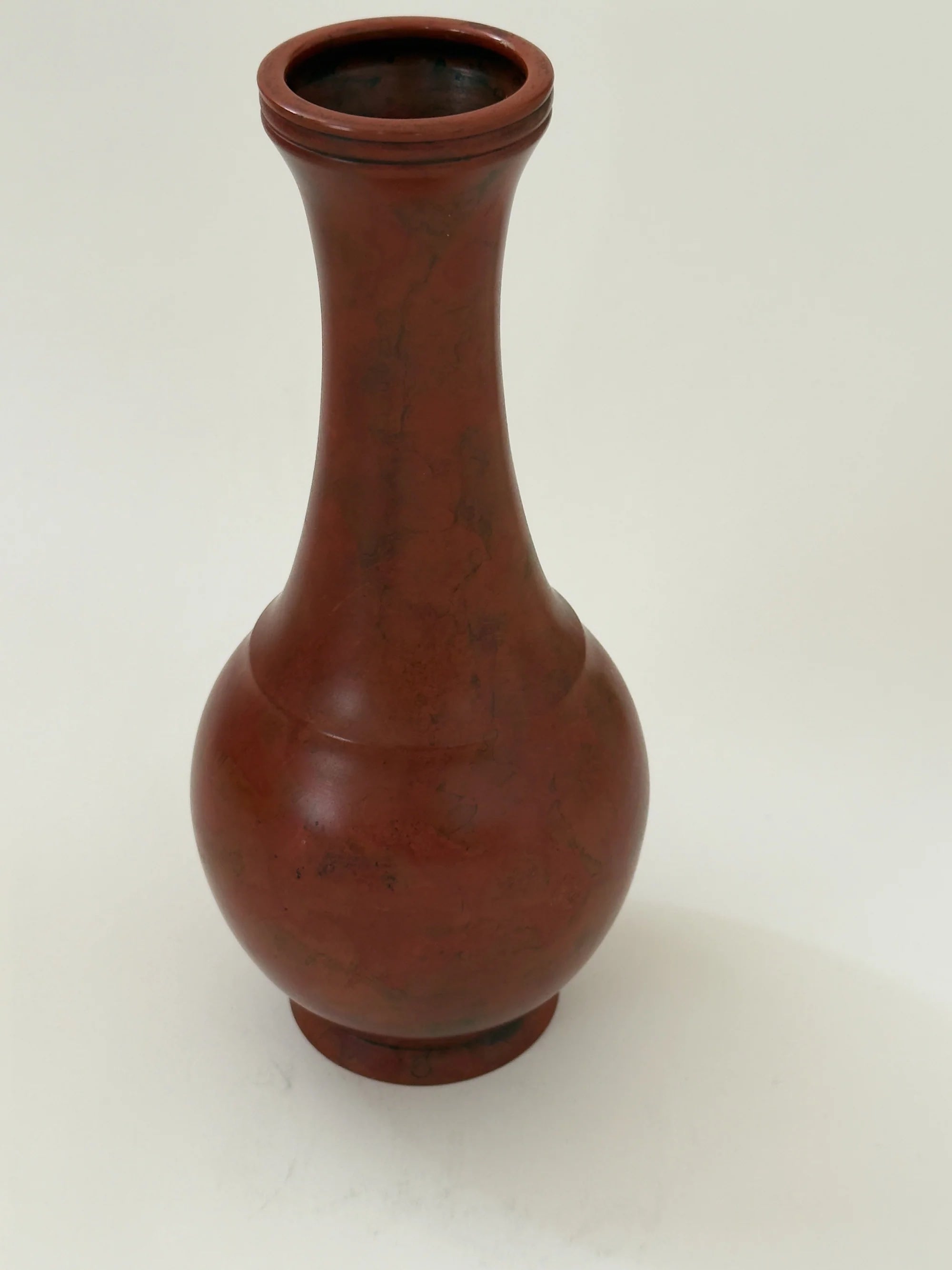 Japanese Bronze Vase with Mottled Vermilion Patina, Signed — angled view on neutral background