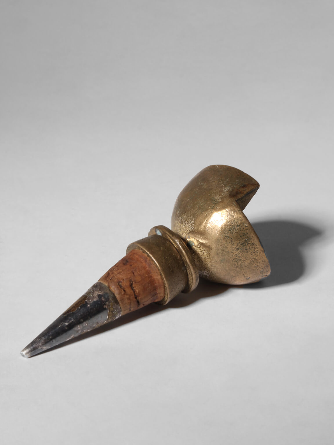 Brutalist Bronze Bottle Stopper — lifestyle setting