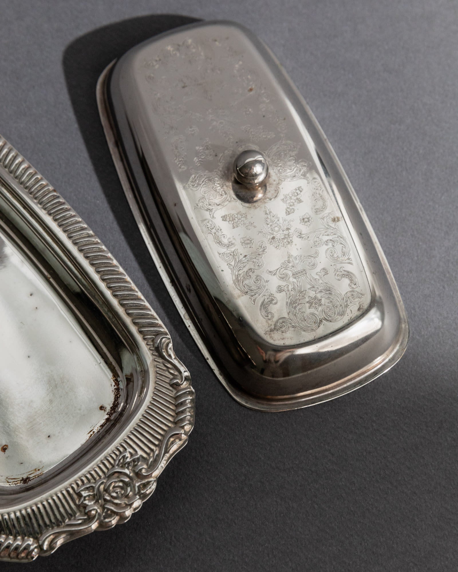 Previous slide Next slide Vintage 1970s Silver Plated Butter Dish, Engraved Ornamental — angled view on gray background