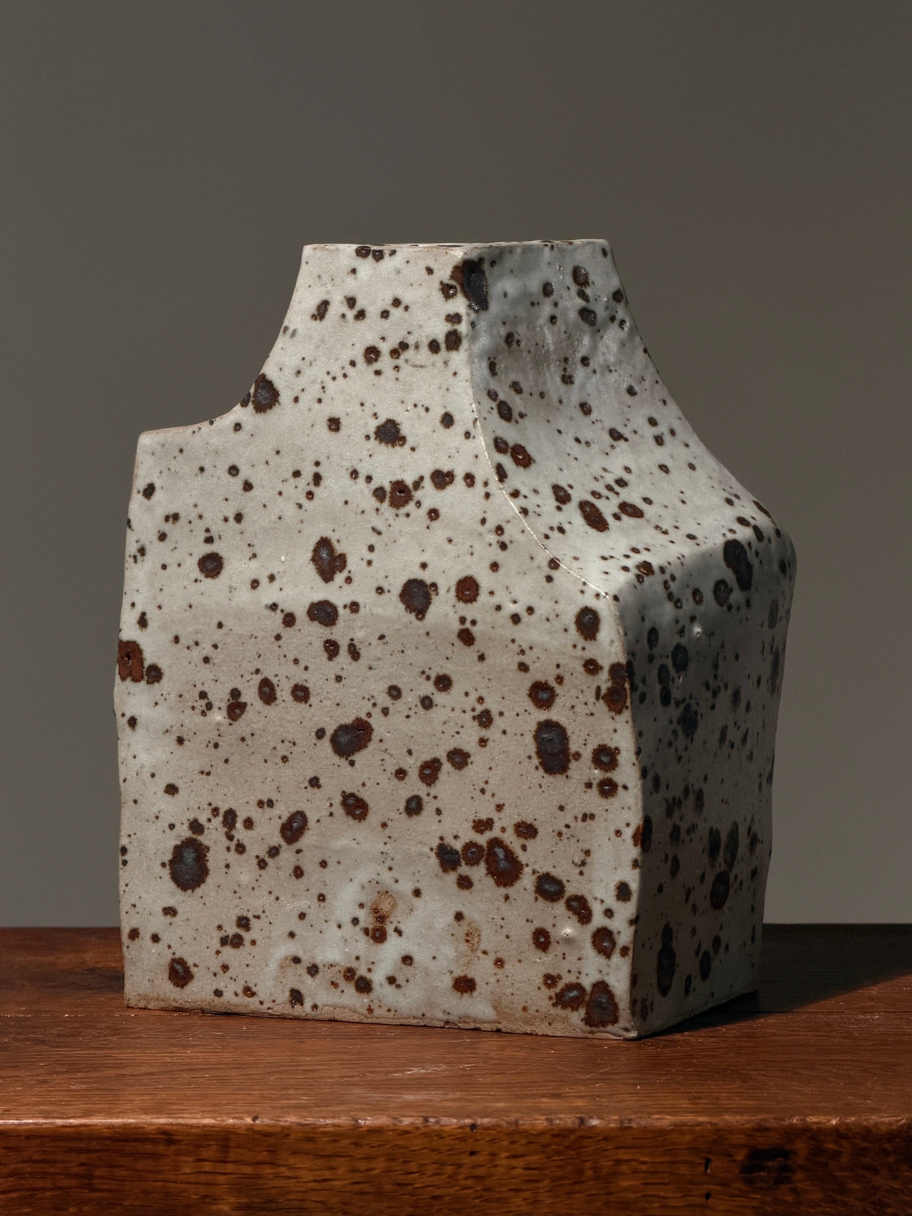 Geometric stoneware vase with pyrite glaze, France, circa 1960. — side angle