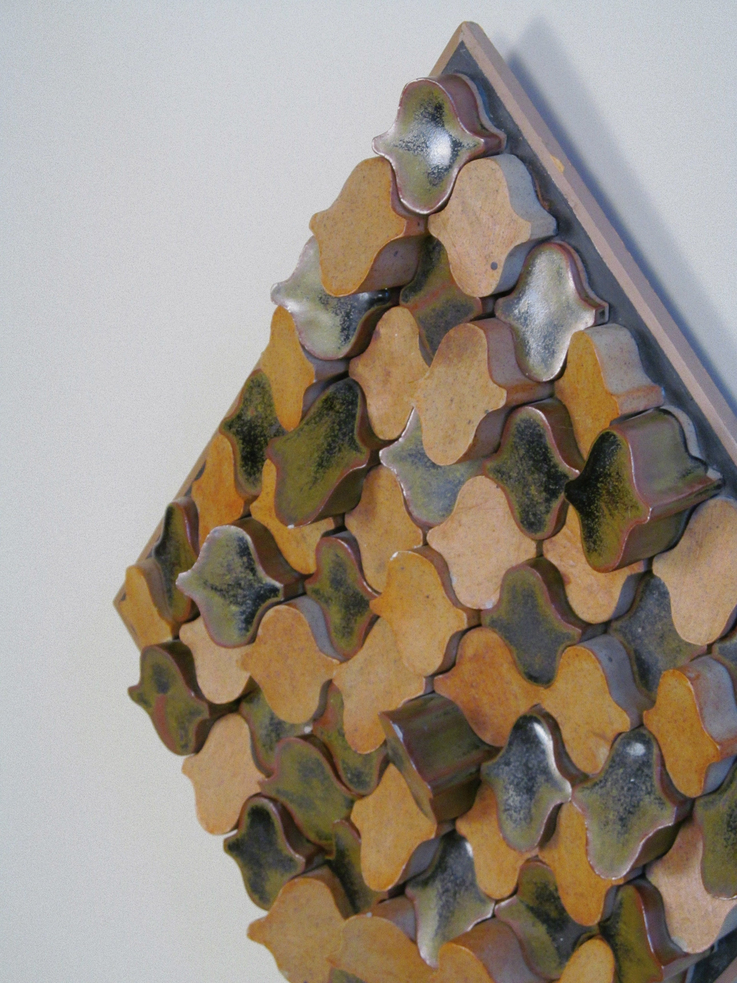 Derbyshire School of Art Ceramic Wall Plaque with Original Case c.1970 — angled view highlighting textured ceramic surface