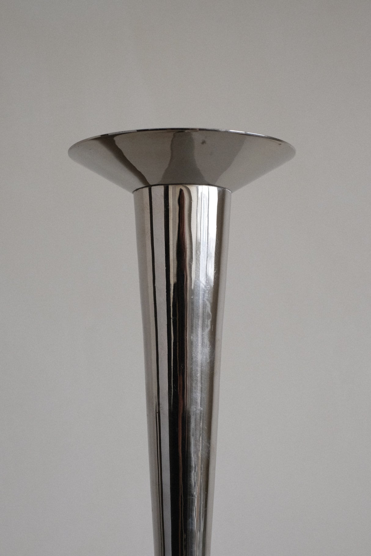 Art Deco Candle Holders — back view of polished metal finish