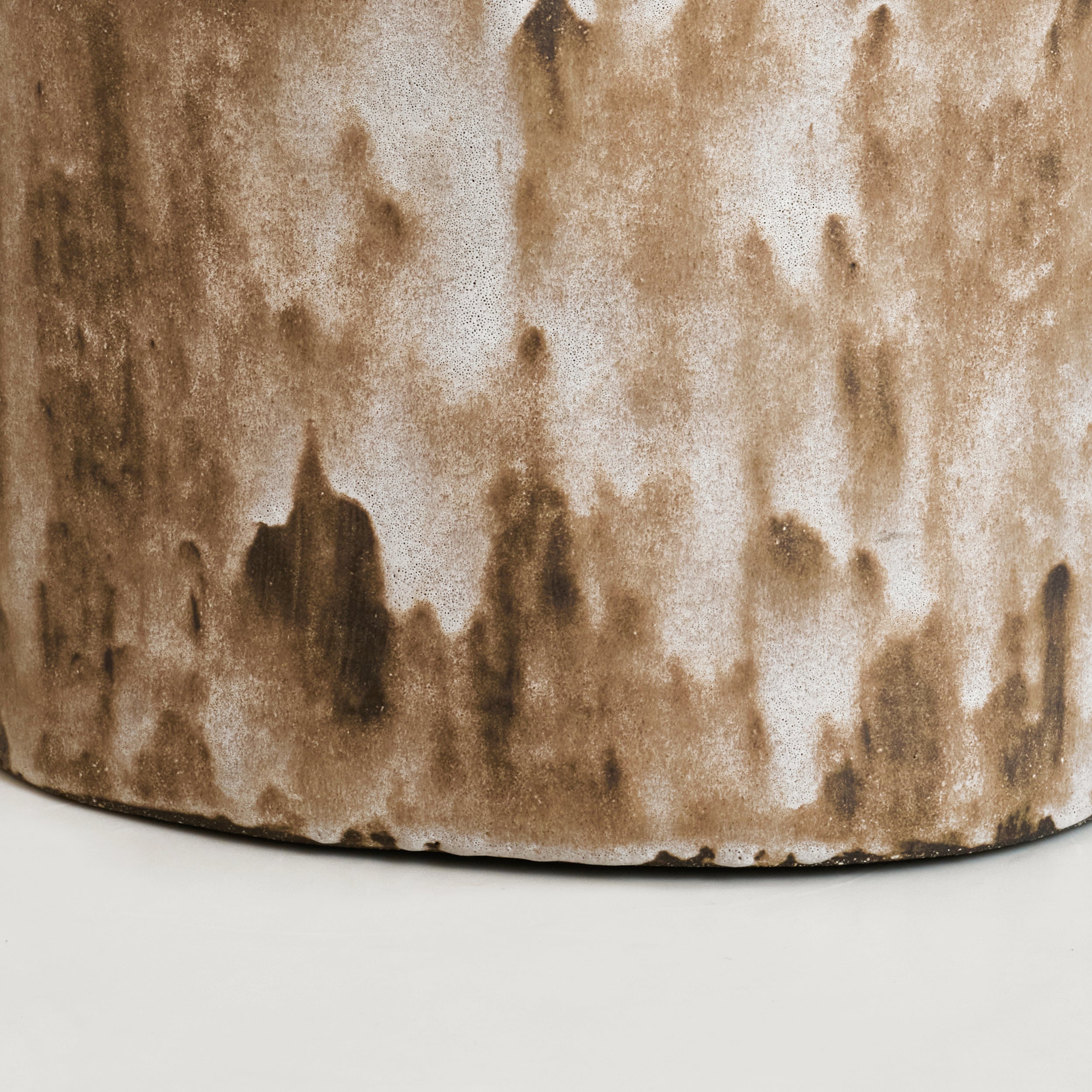 Ceramic Side Table (small) — close-up of textured brown ceramic surface