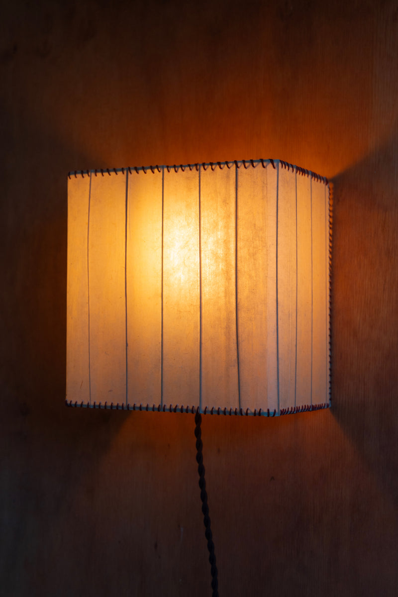 Magdalena Sconce — close-up of warm light through textured shade