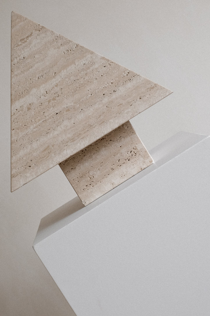 Travertine Pyramid Table Lamp — top view of light-colored travertine design