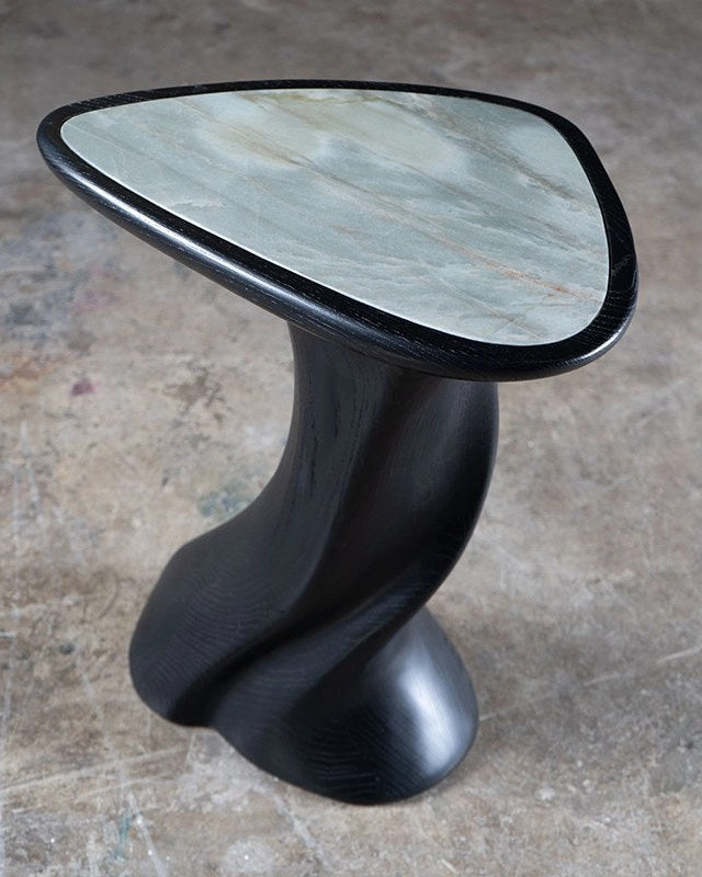 Abbi Side Table in Ebony Stain on Ash wood with Marble Top — close-up of marble top with curved wooden base