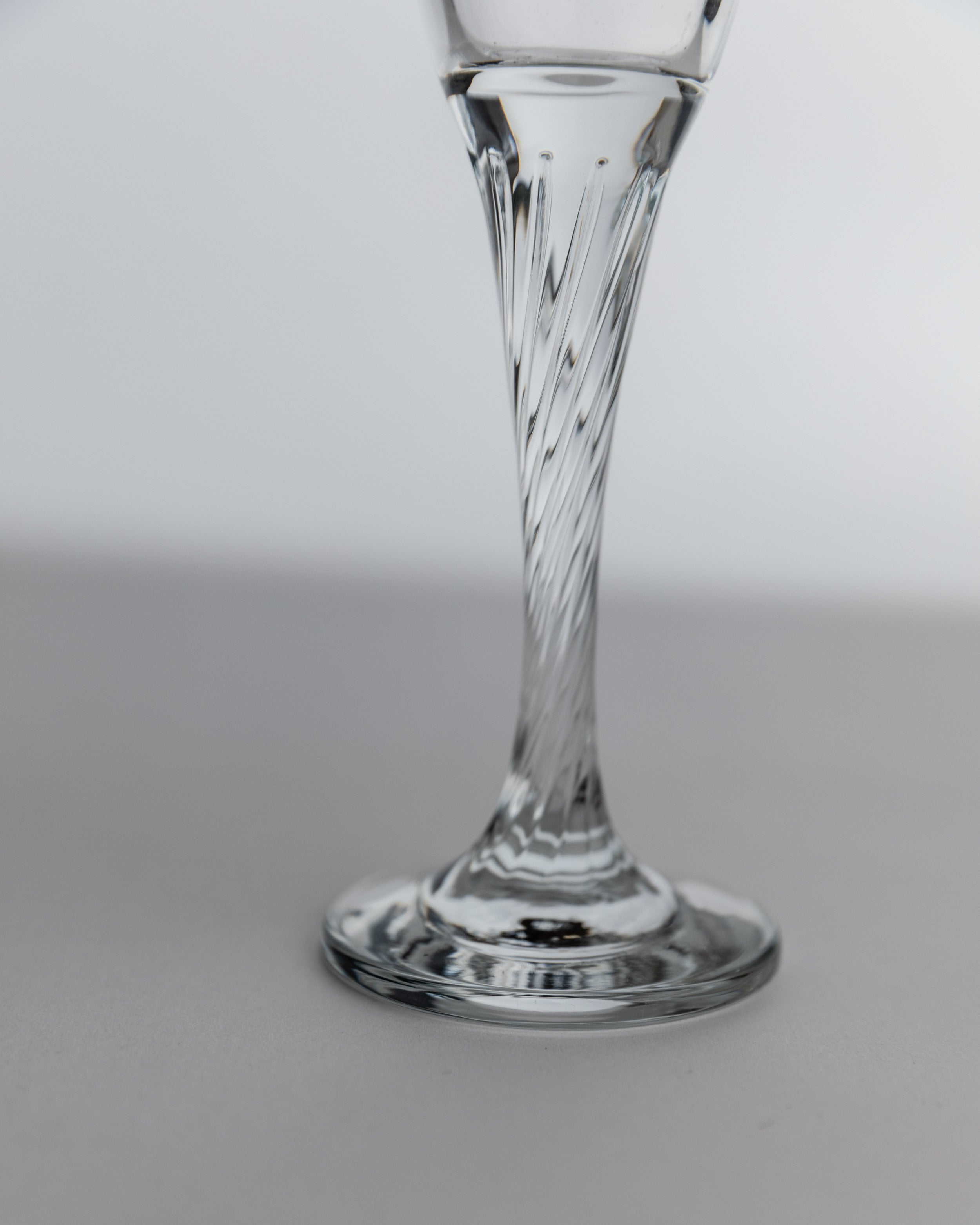 Twisted crystal stem detail of 1980s champagne flute