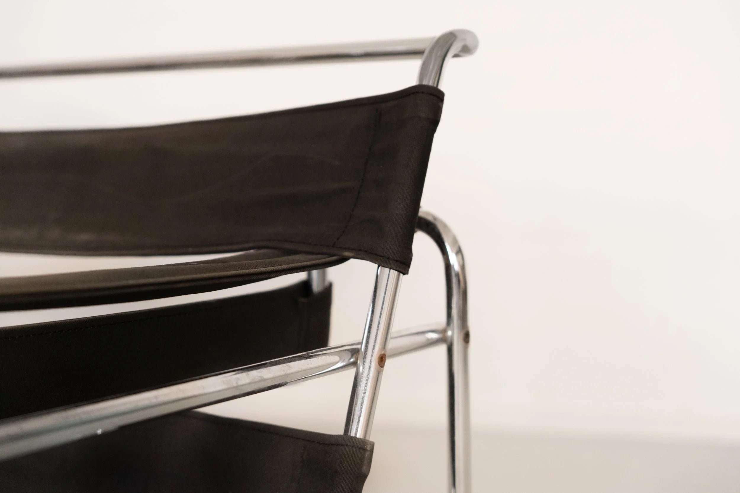 Wassily Chair by Marcel Breuer for Gavina — close-up of chrome frame and black canvas