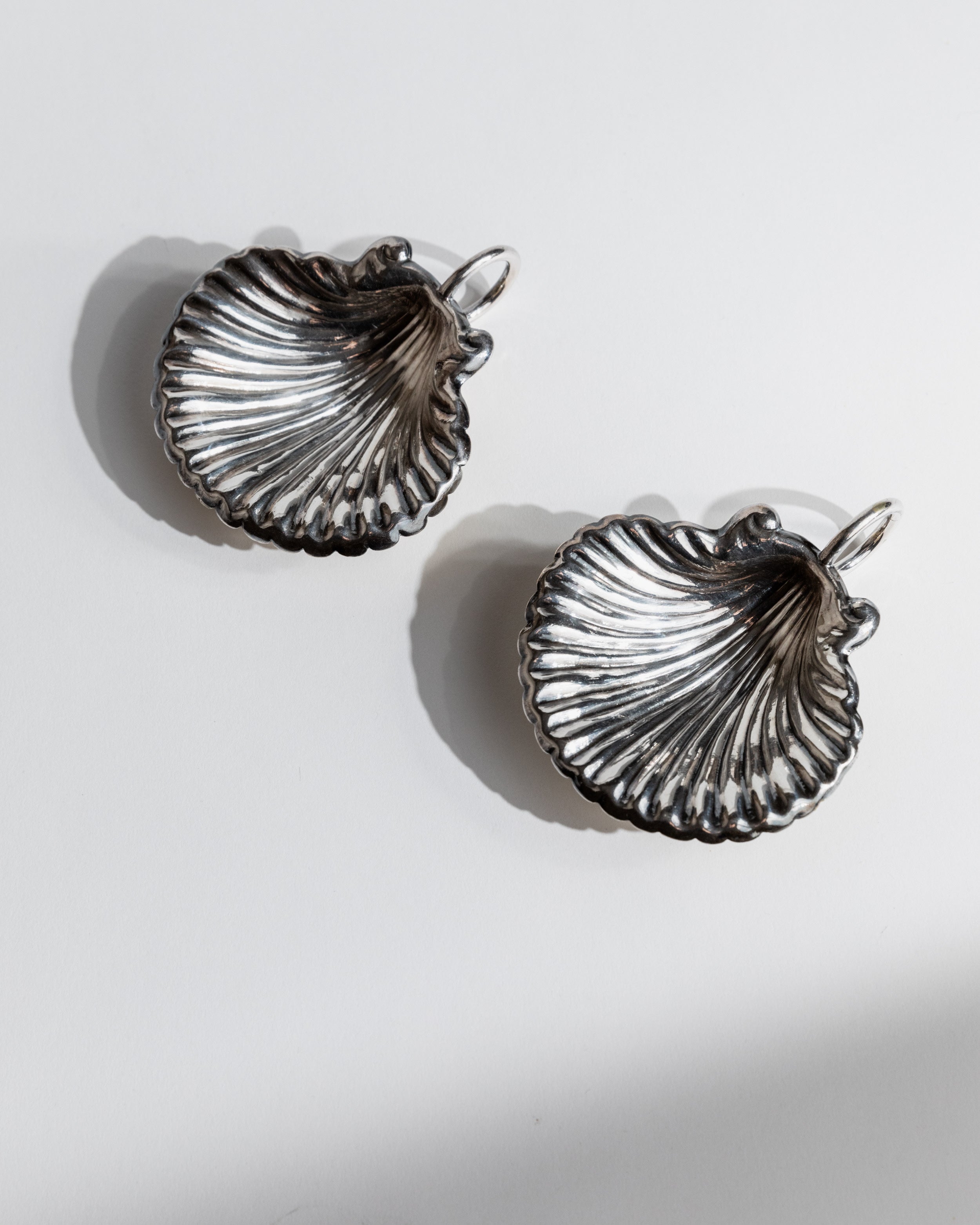 Pair of vintage silver shell-shaped serving bowls from above