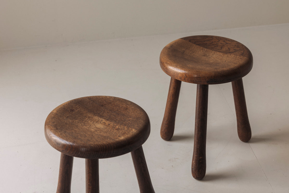 Set of Two Tripod Solid Elm Stools, France 1960s — lifestyle setting