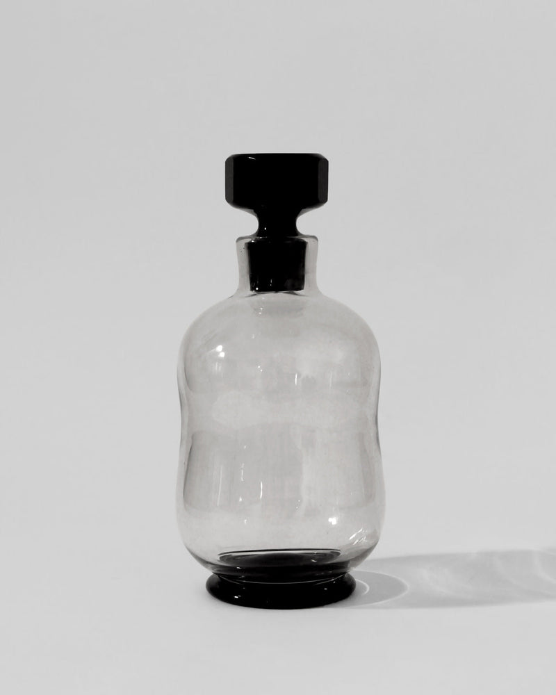Smoky Black Mid-Century Glass Decanter by Vintage Stories | The Oblist — glass material, vintage design