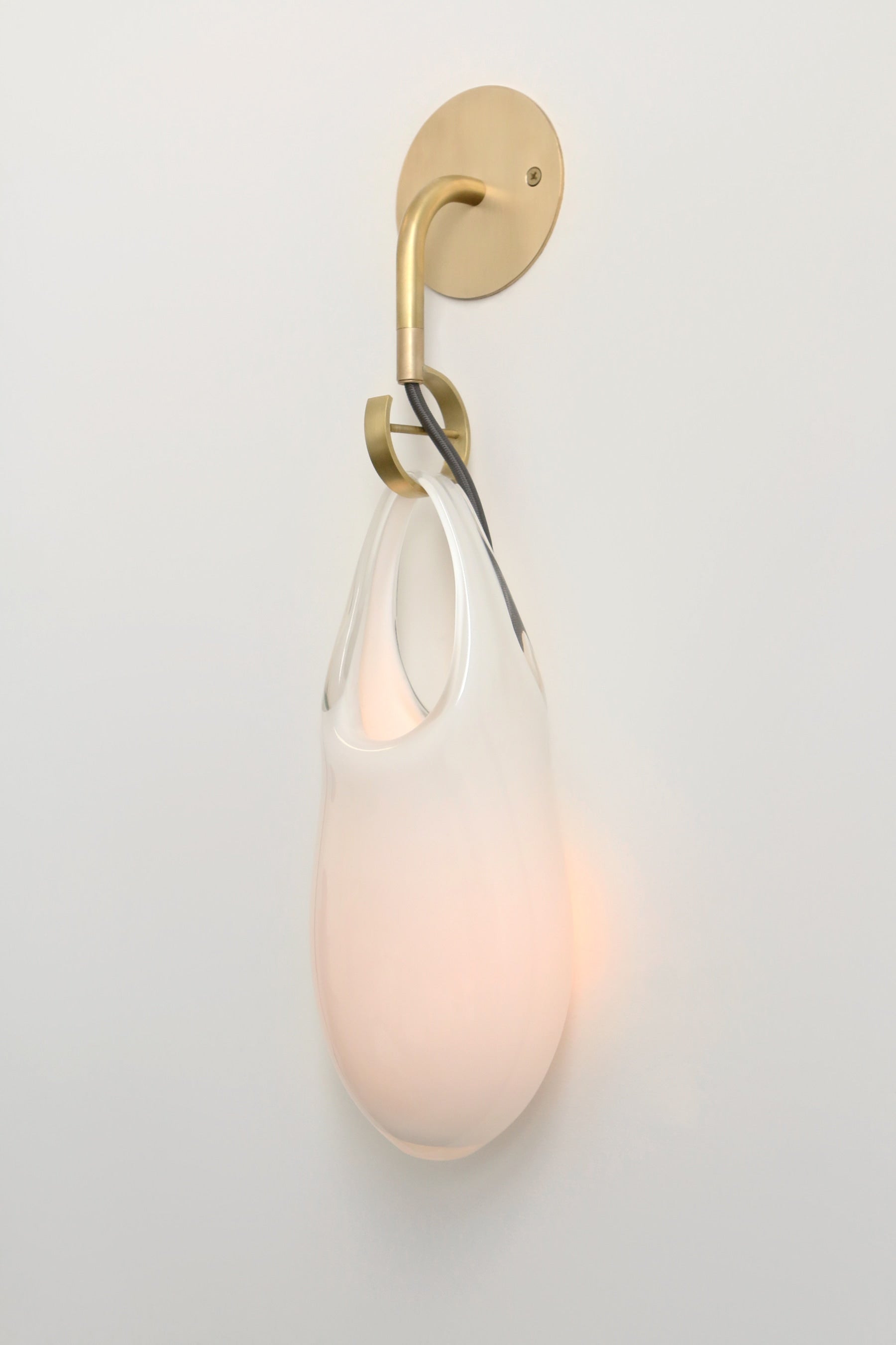 SkLO Hold 12 Sconce, White Glass, Brushed Brass, Black Cord — detail view