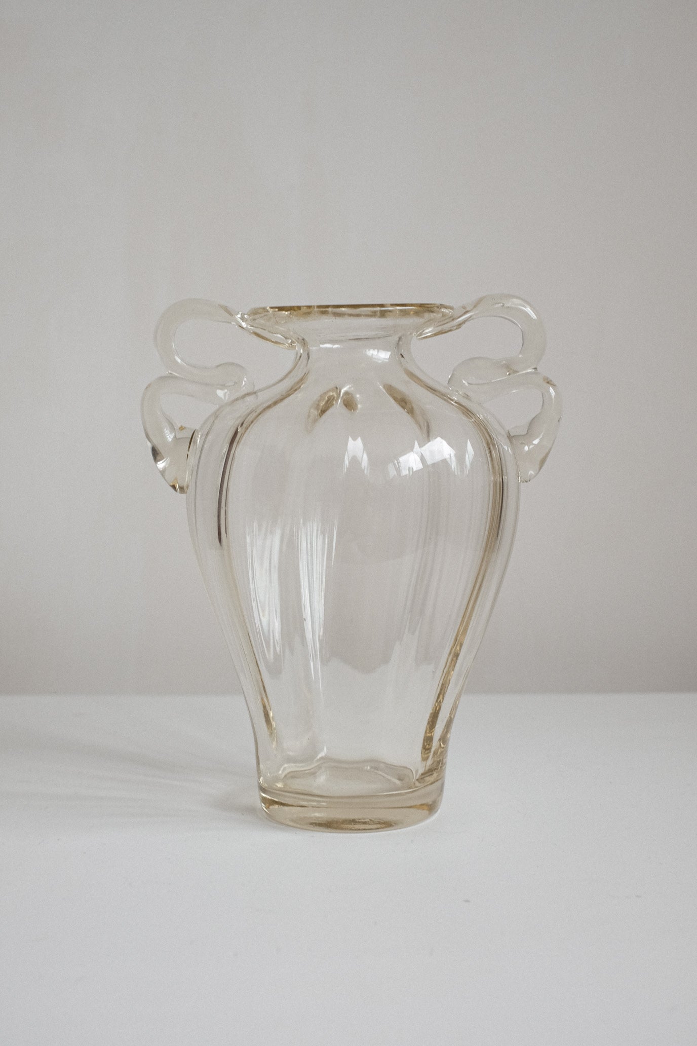 Elegant Handcrafted Glass Vase with Decorative Handles — close-up