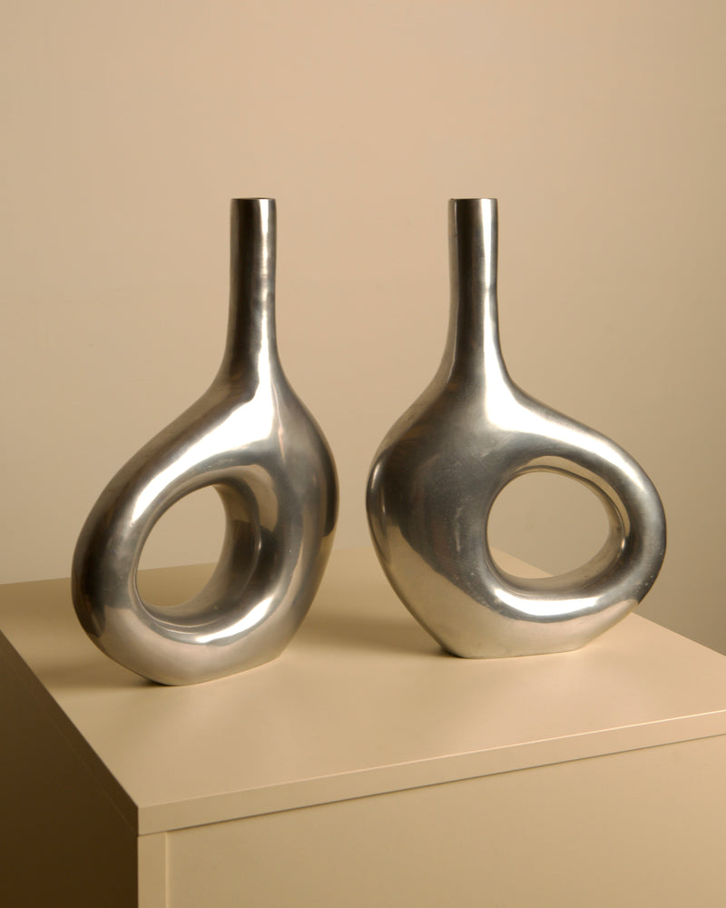 Pair of Italian cast aluminum vases from the 1980s — detail view