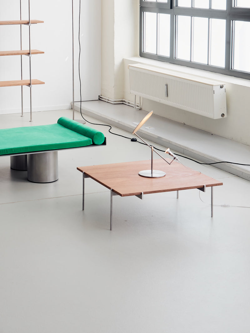 Lightweight Lounge Table — angled view with wooden top and metal legs