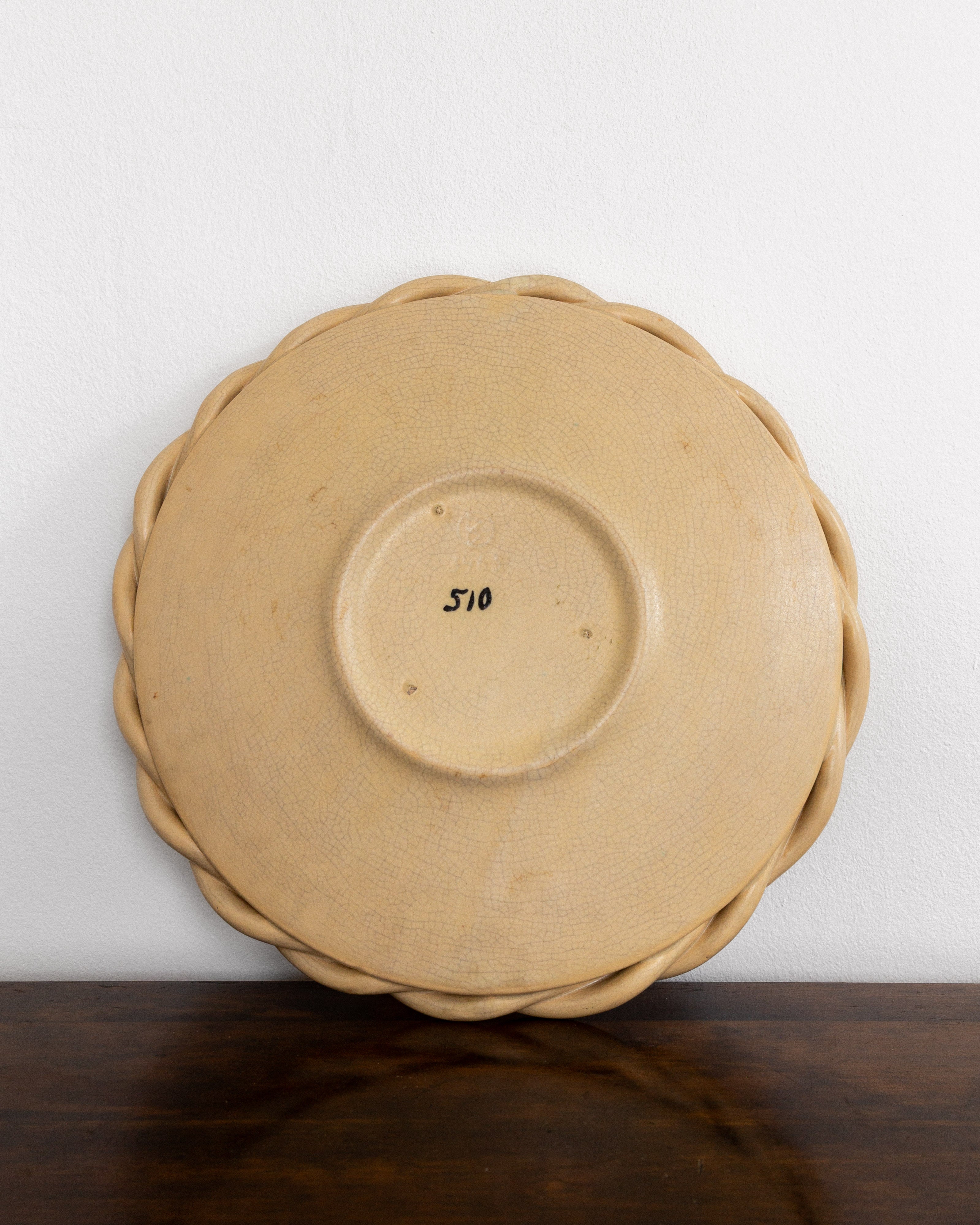 Large Decorative Ceramic Plate by Eva-Jancke Björk, 1940s, Sweden — top view showing textured beige surface and braided edge