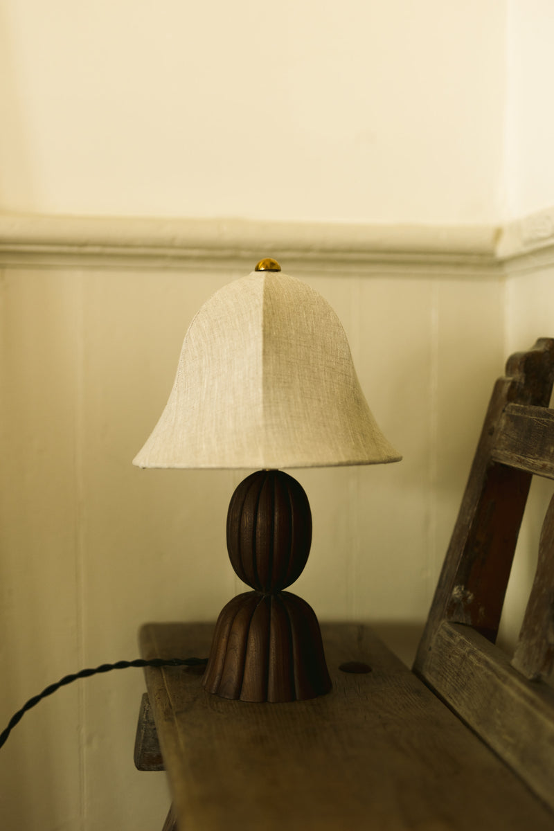 Gwen Table Lamp — close-up of linen shade and wooden base