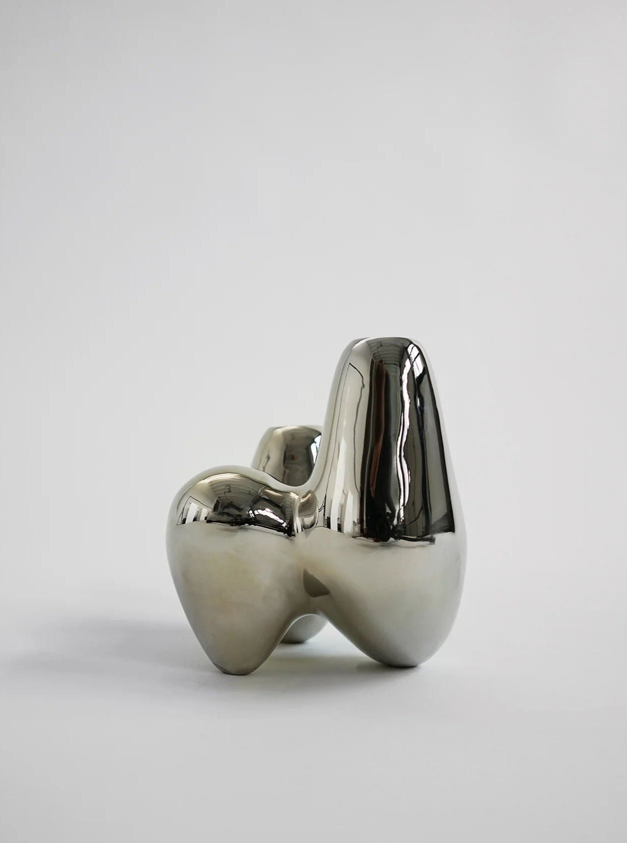 Unity Candleholder - Silver — top view highlighting polished metallic finish