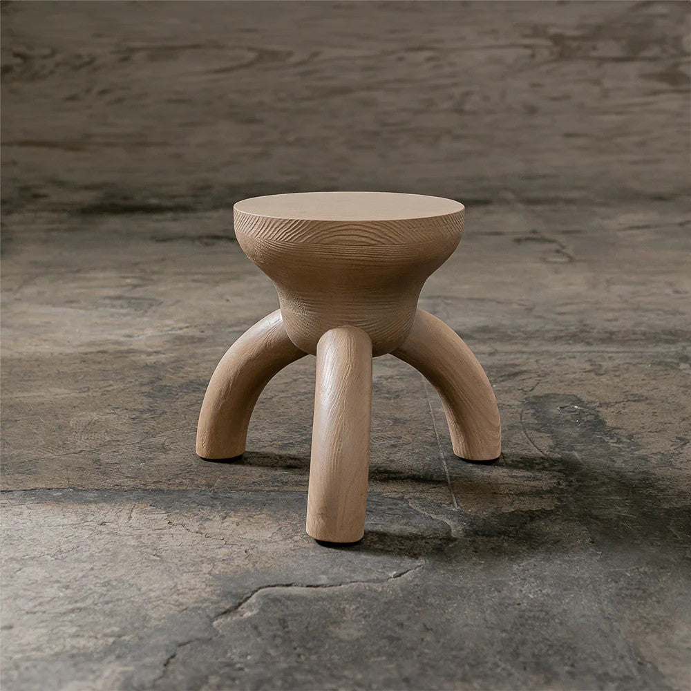 ELEMENTOS Set of Stools, Sandblasted Pine with Black Finish by Daniel Couttolenc — side angle showing rounded seat and curved