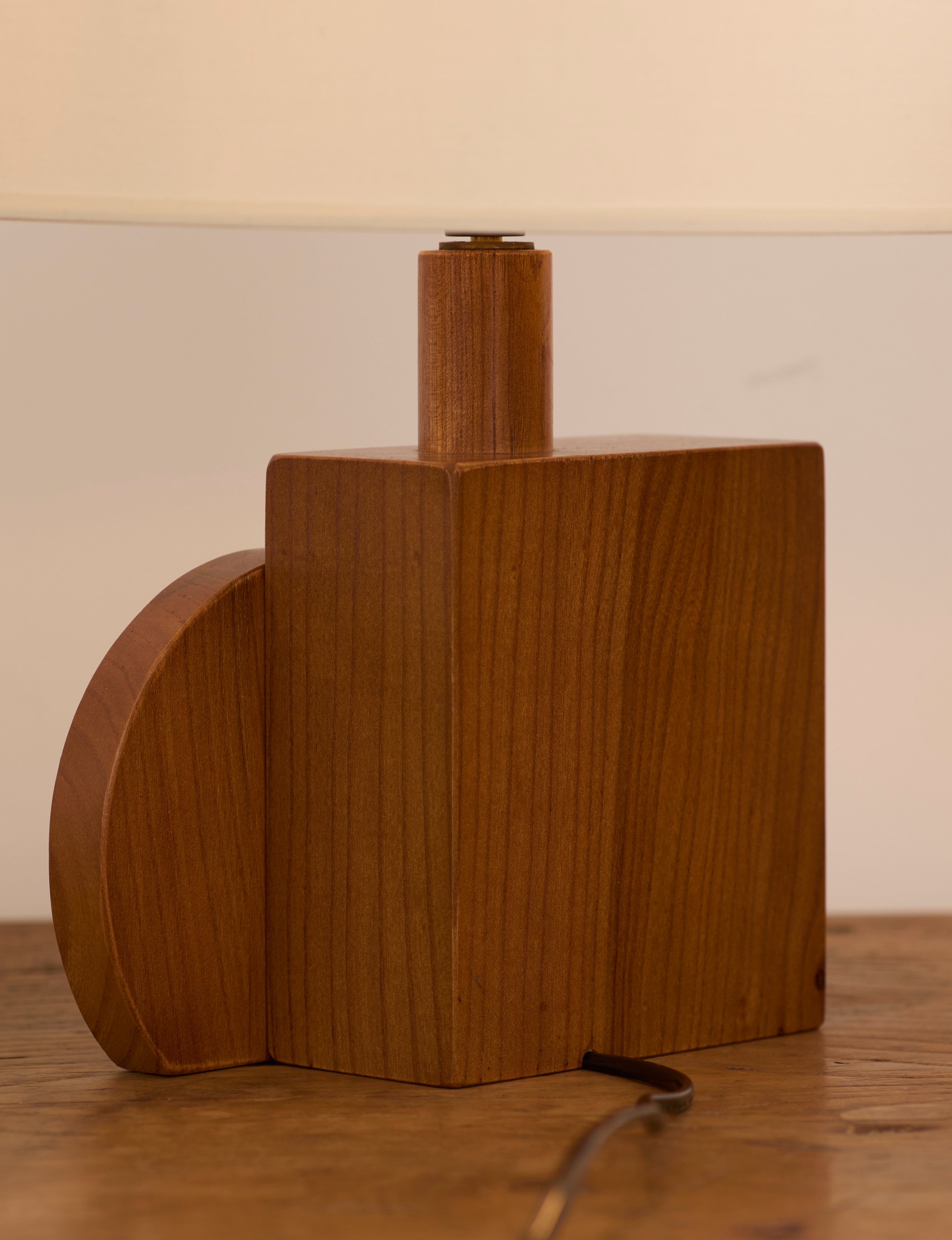 Set of 2 Vintage Artisanal Table Lamps In Solid Wood From France c. 1970 — close-up of warm wood grain texture