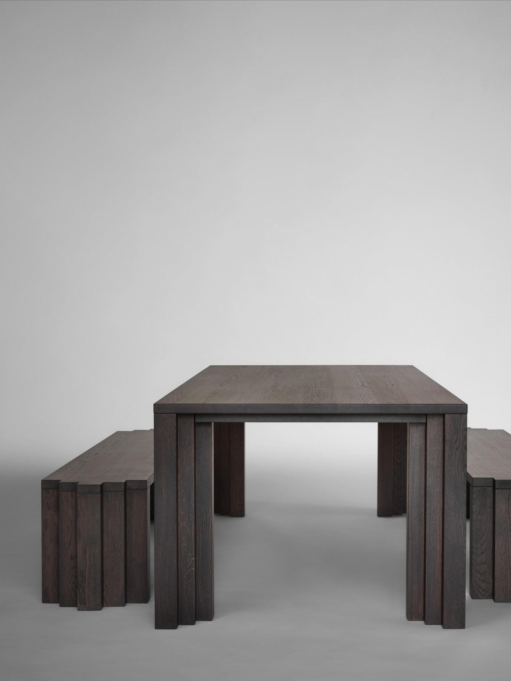 Cadence Bench — top view of dark wood seat and legs