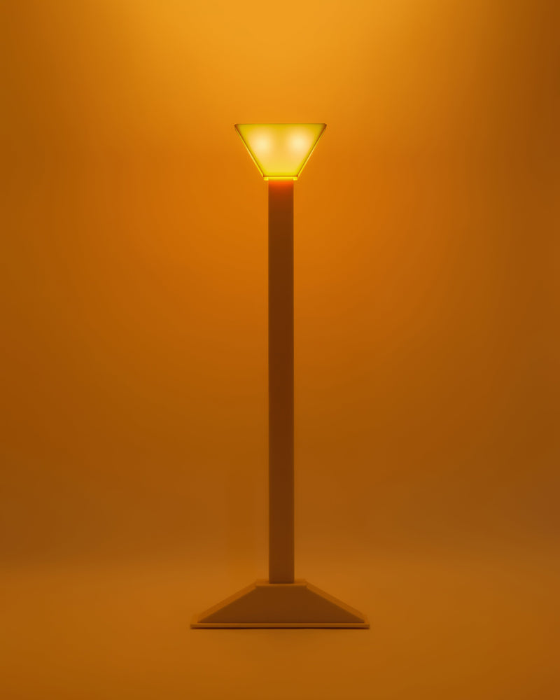 Radiant Abs floor lamp with amber glass shade and bronze base