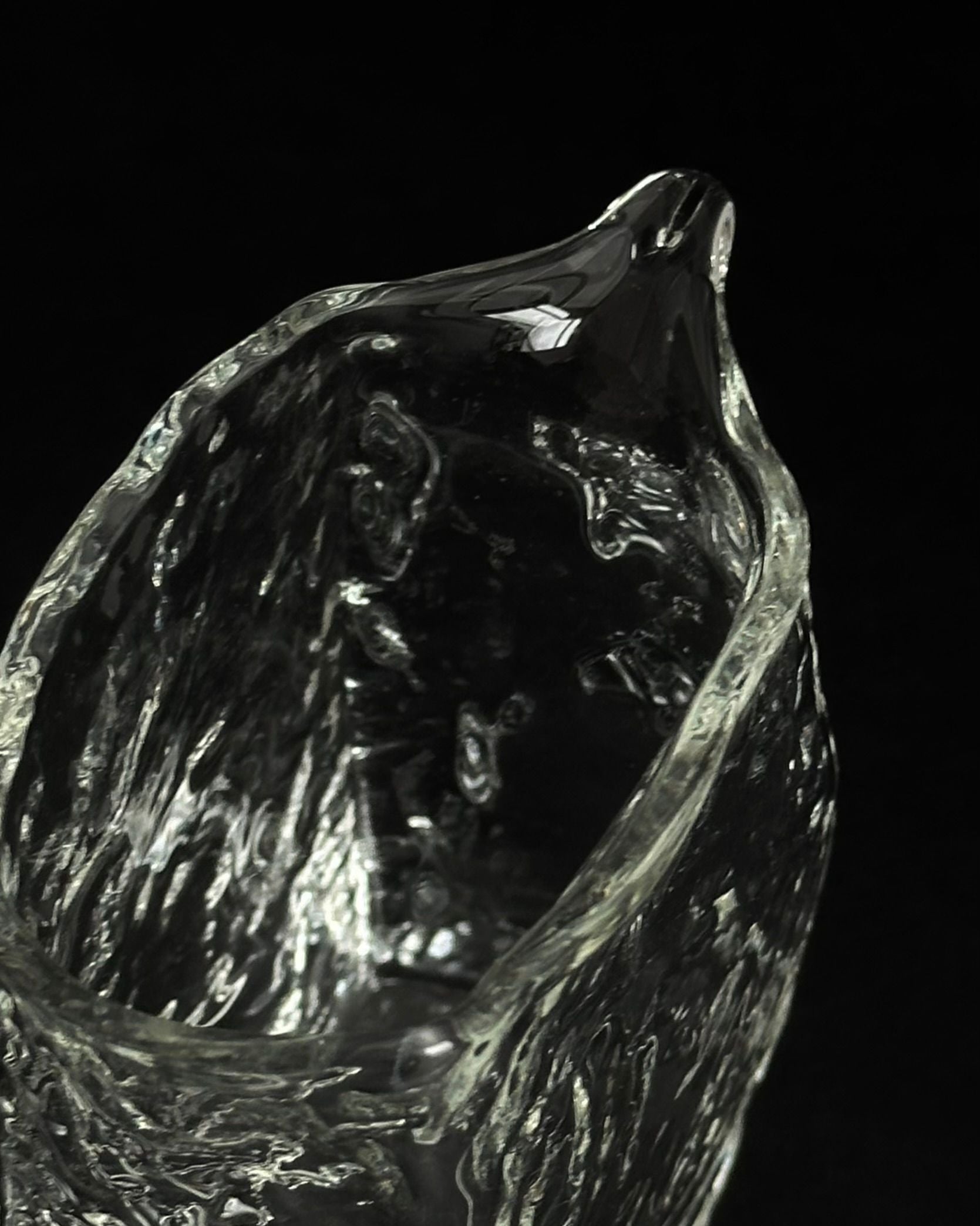DELIRIUM' small glass pitcher — close-up view highlighting textured glass surface