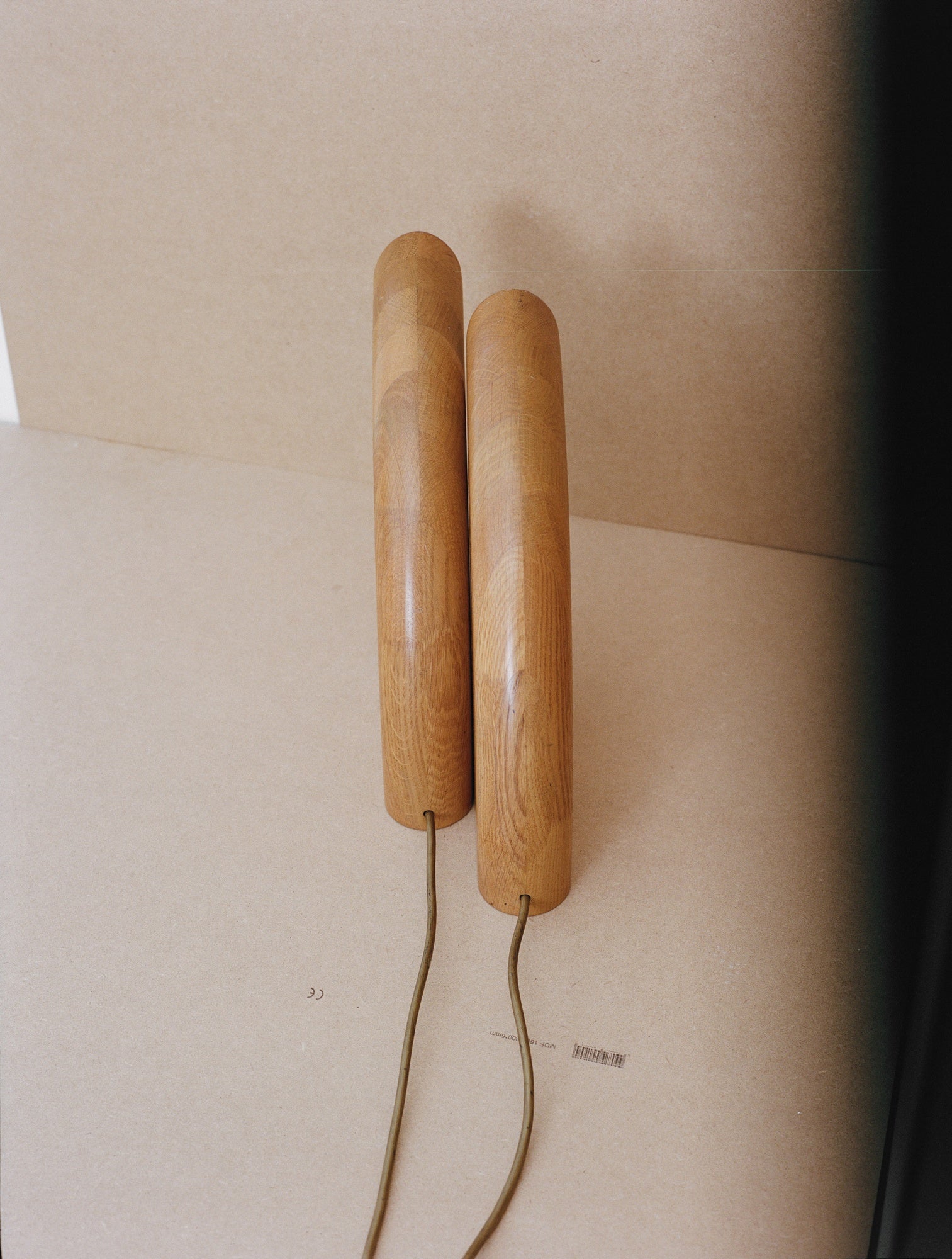 Set of 2 Vintage French Artisanal Table Lamps in Solid Oak Wood C. 1980 — top view of rounded oak lamp bases
