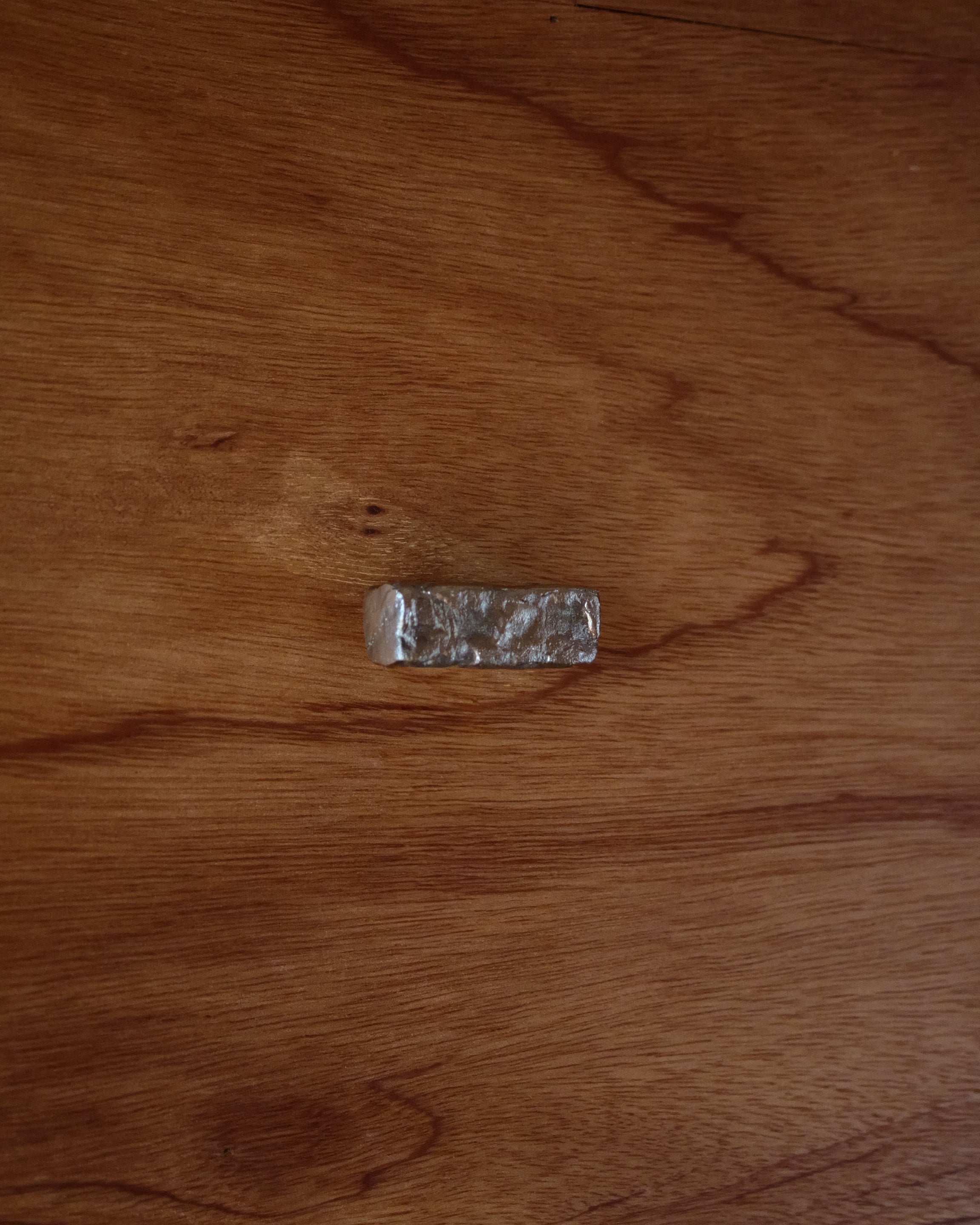 ISLE Cabinet Knob/Wall Hook Medium — top view on wooden surface