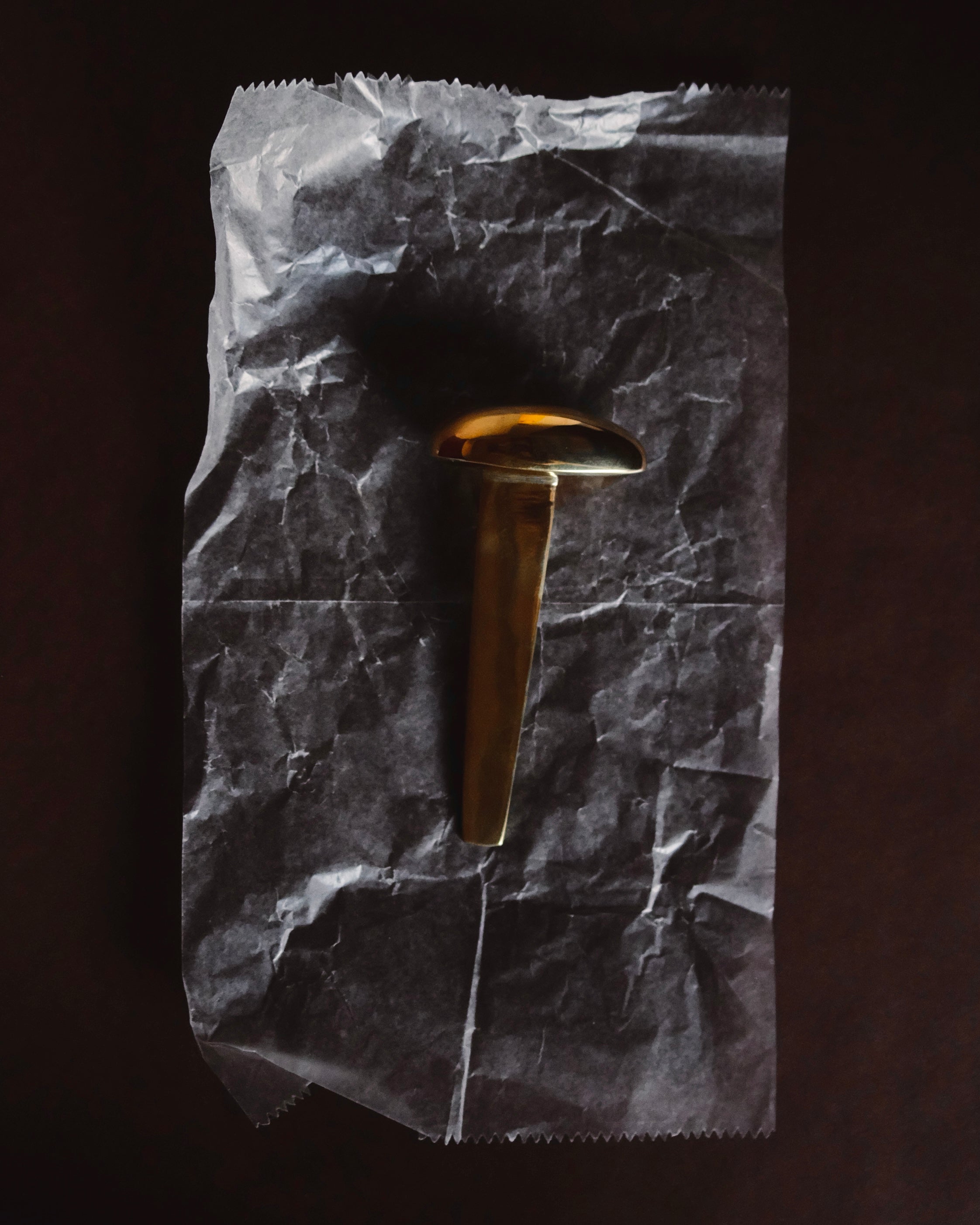 MOMI Bookmark No. 2 — top view on crumpled paper background