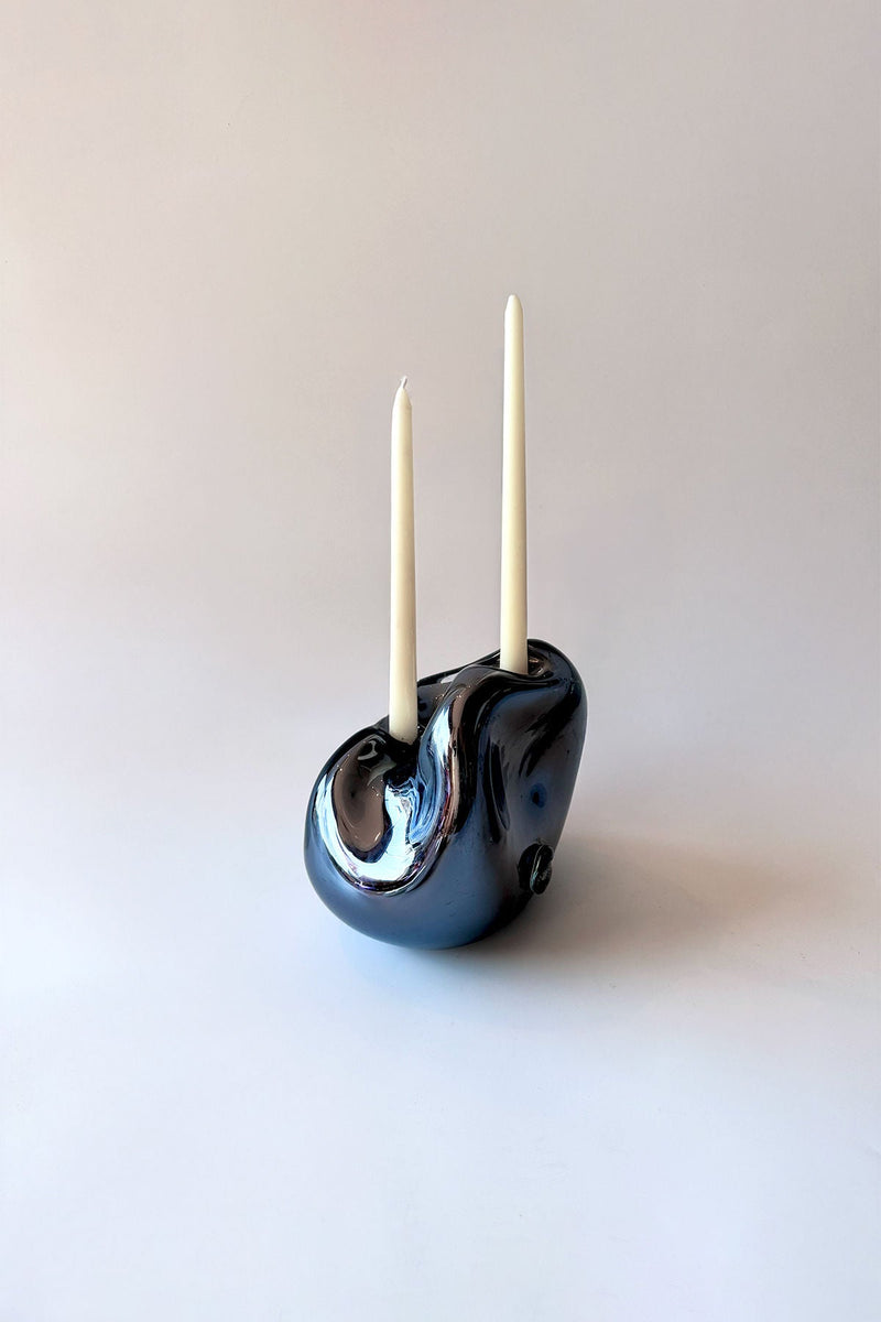 Lumi Candle Holder IV — close-up of glossy black ceramic with candles