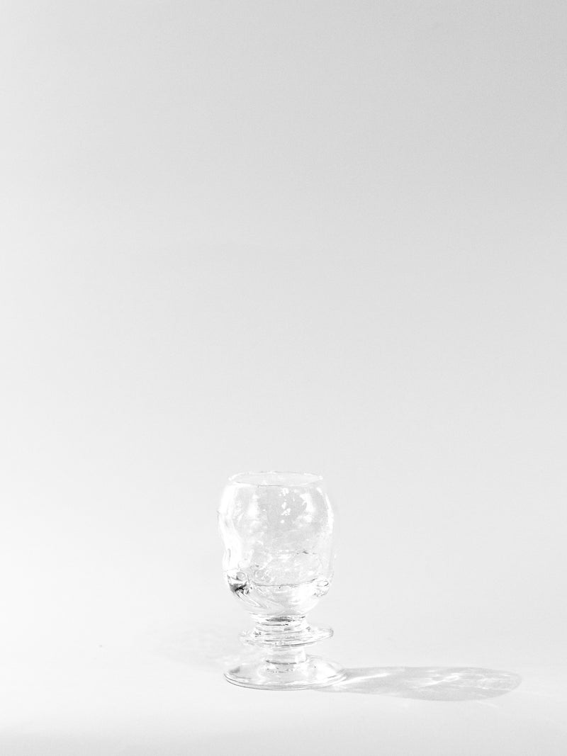 Round Free-shaped Glass — close-up of clear glass with textured surface