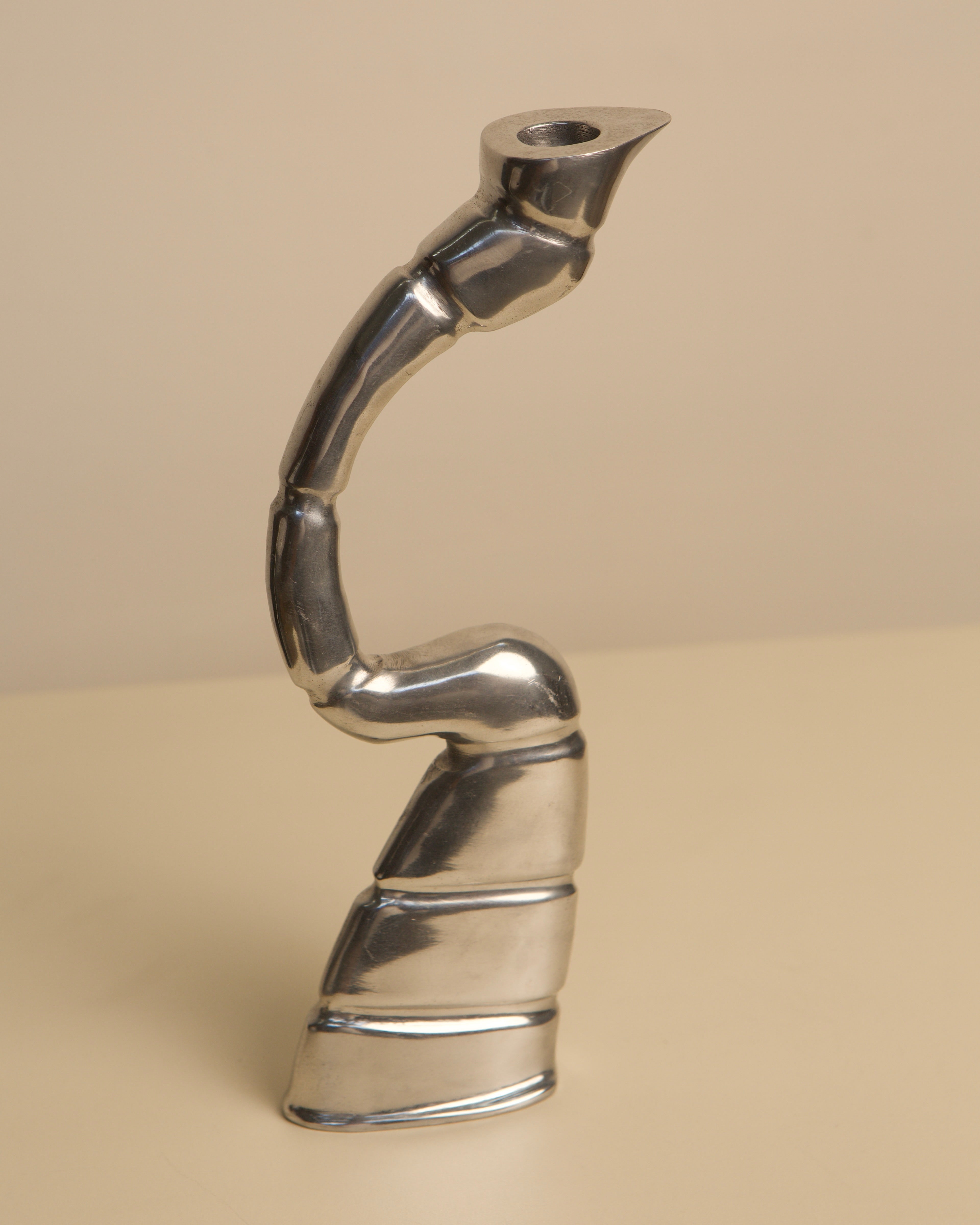 Polished chrome Scorpion candleholder curved sculptural design