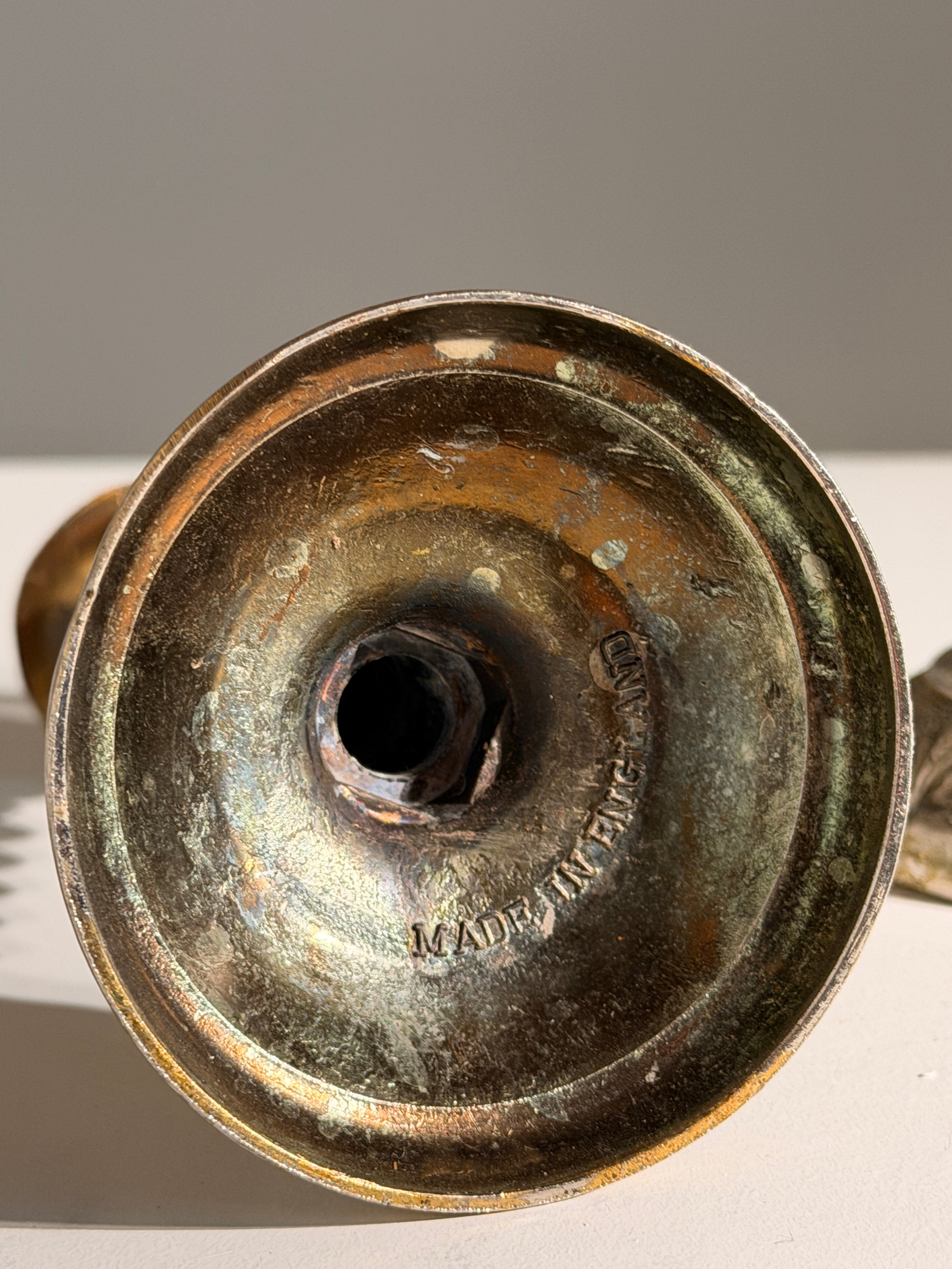 Pair of silver-plated candle holders, England — side angle