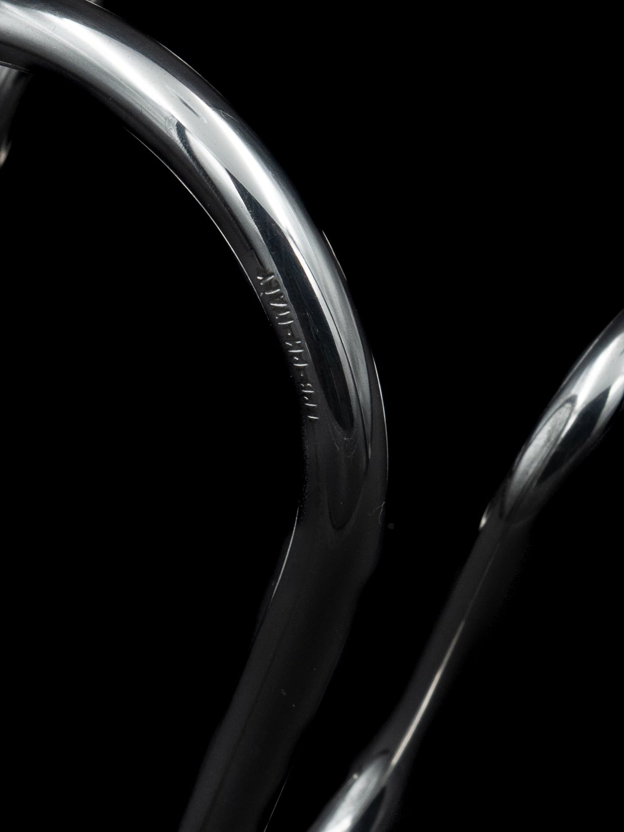 Continuous Loop Candle Holder, Italy, c. 1950s — close-up of polished metal finish