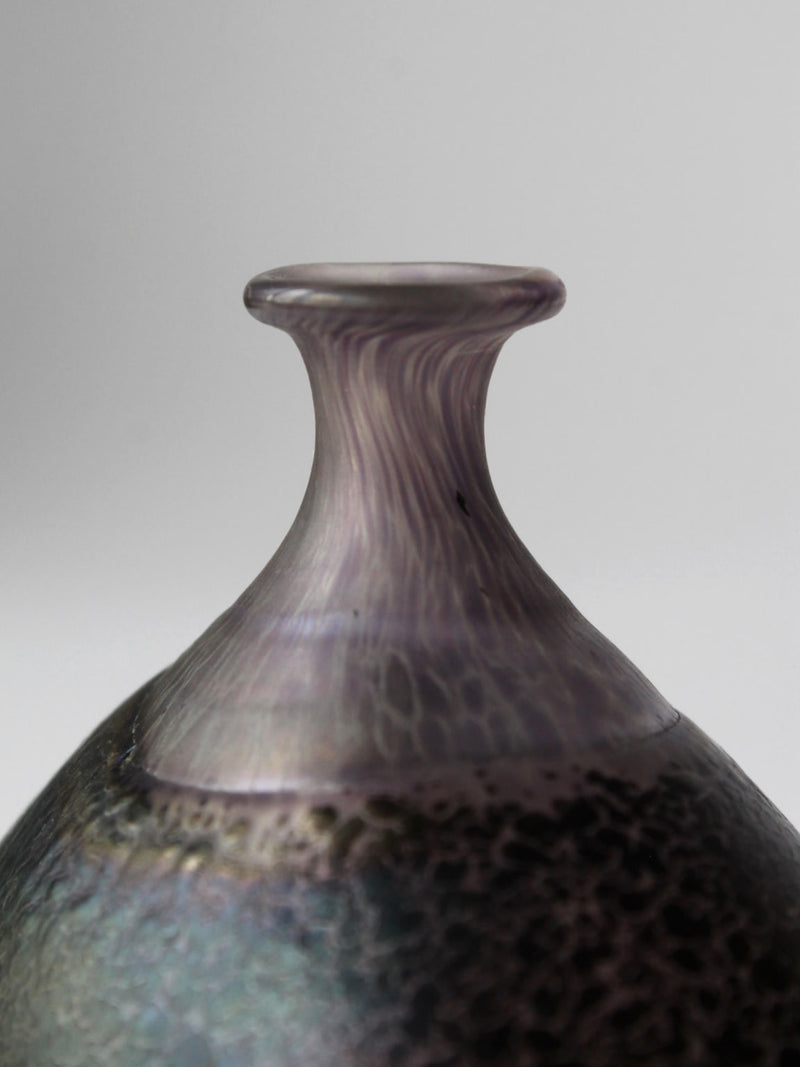 Close-up detail of Volcano art glass vase neck with flowing ridges