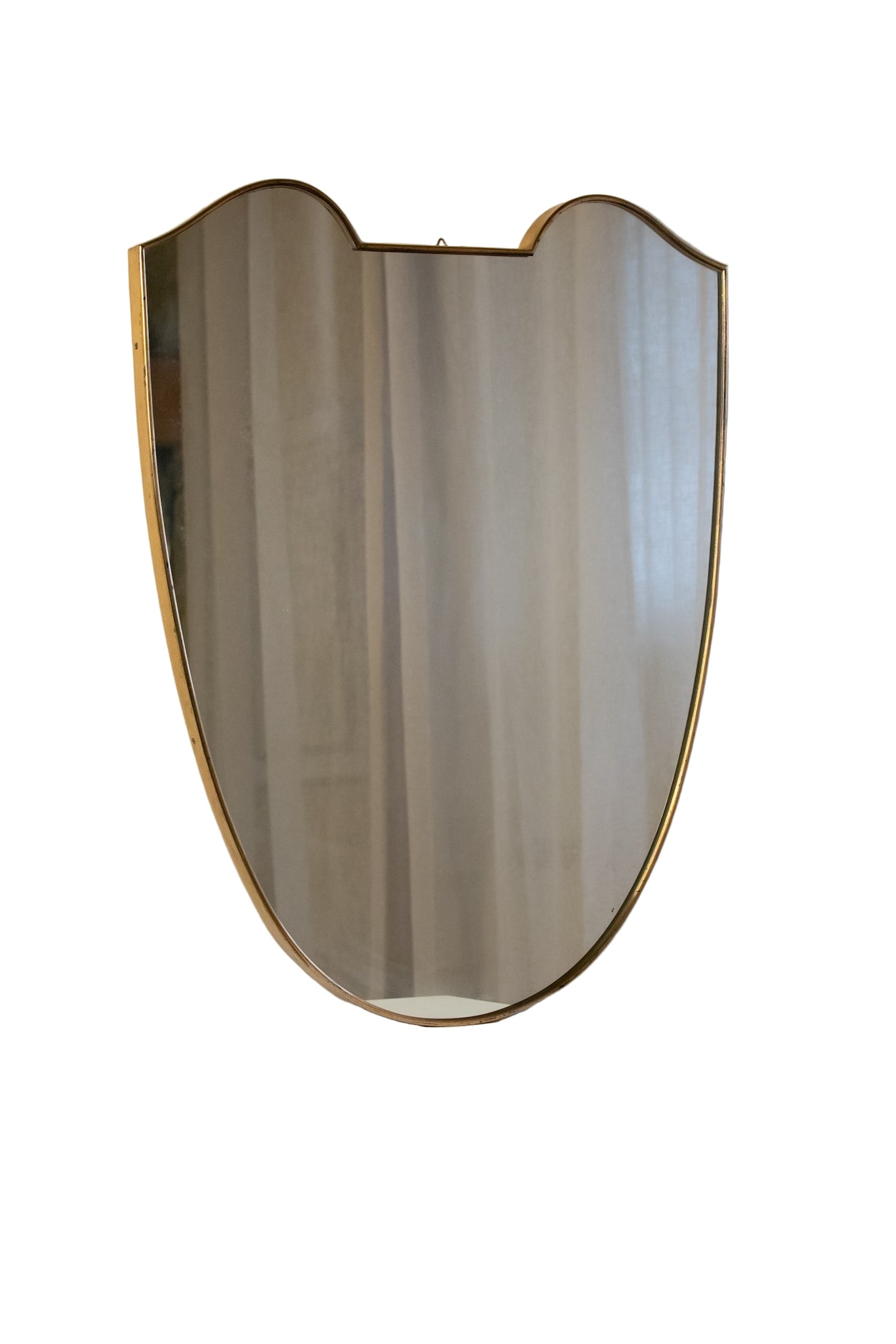 Large Midcentury Italian Brass Shield Mirror — front view with reflective surface