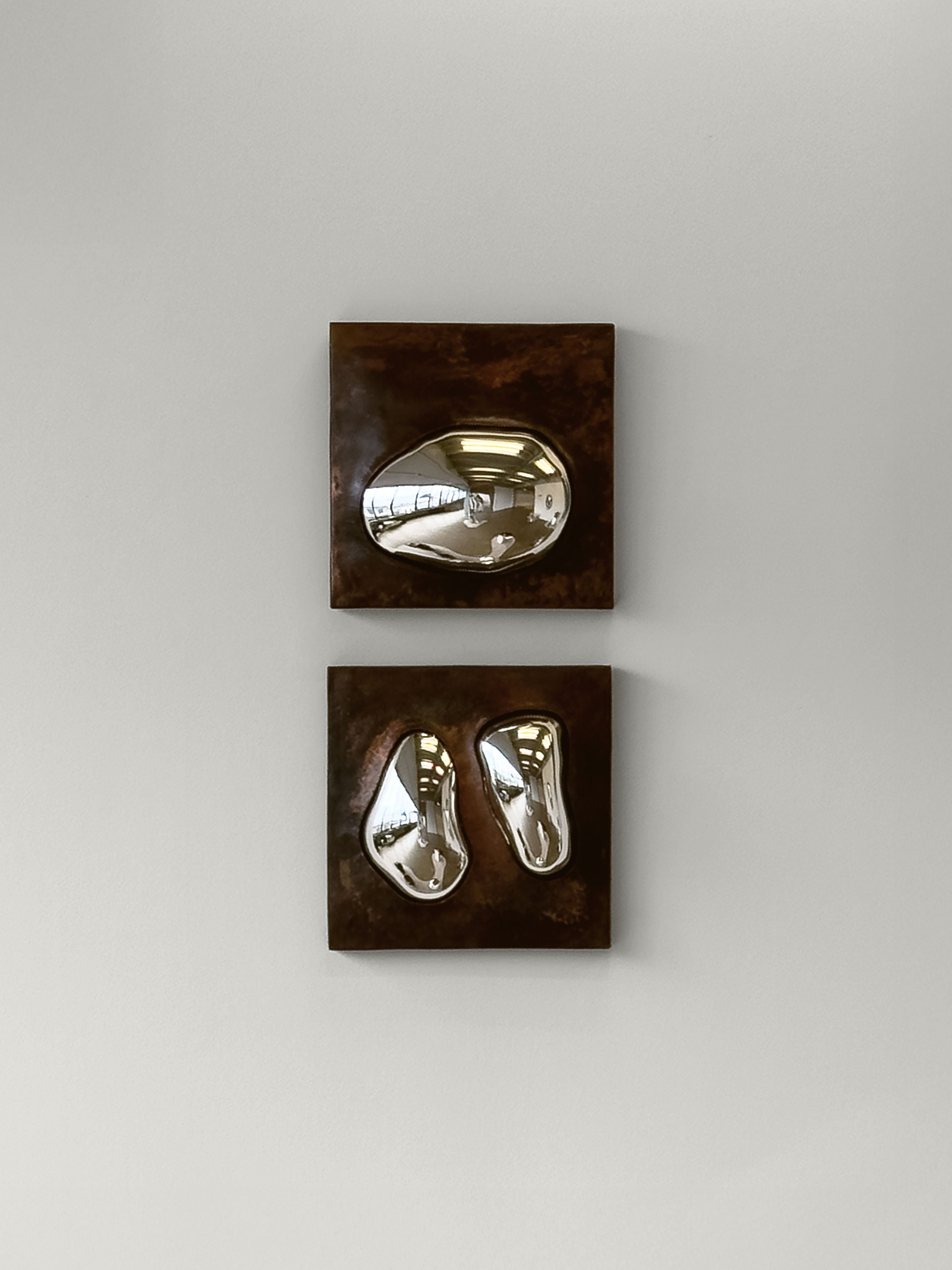Drop of Silver on Copper II' Wall Sculpture — top view of silver shapes on copper background