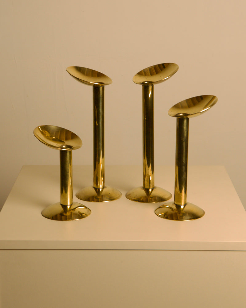 Set of 4 Danish brass candlesticks from the 1960s by Treaptyque | The Oblist