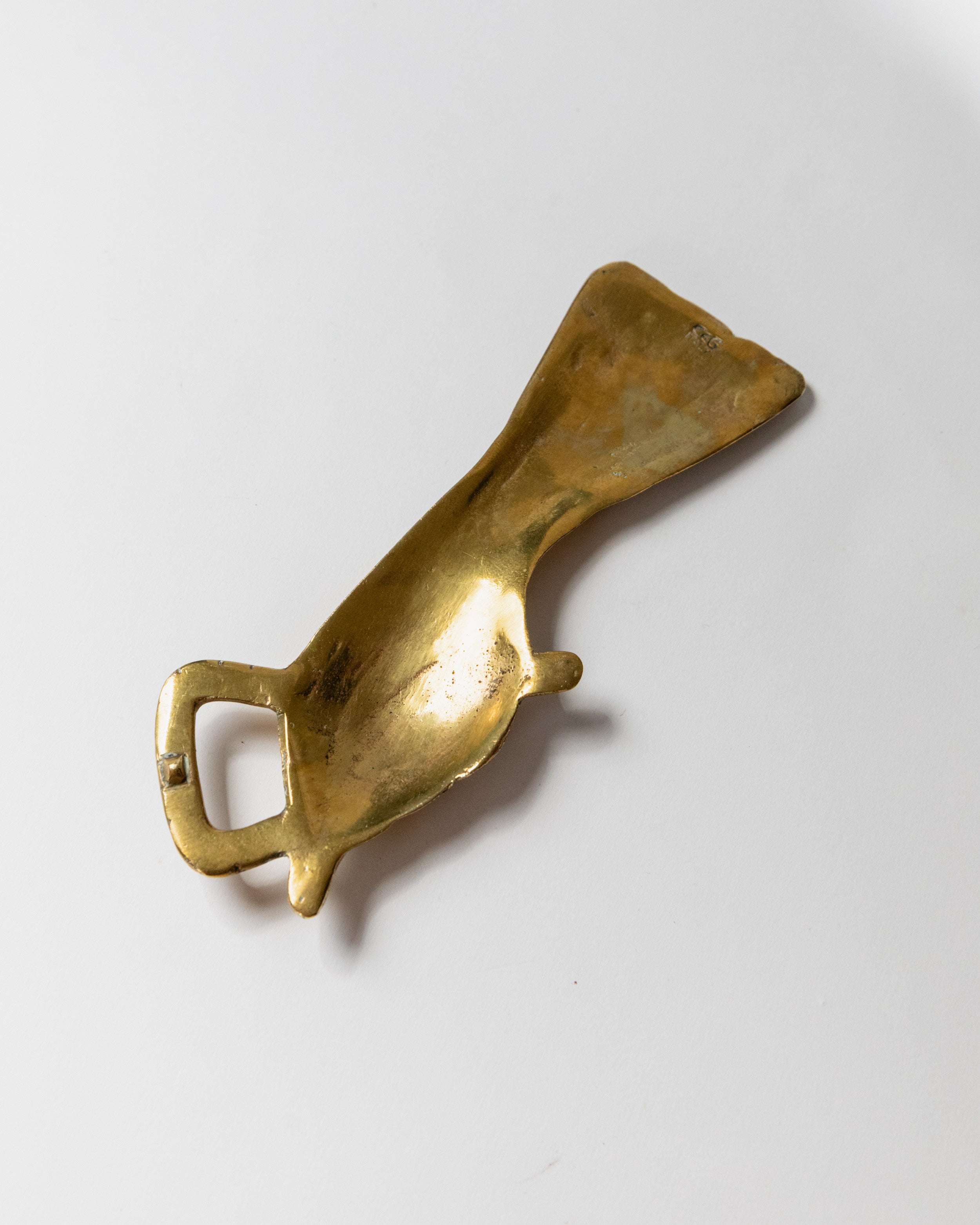 Brass bottle opener CEG Italy 1950s curved design detail view