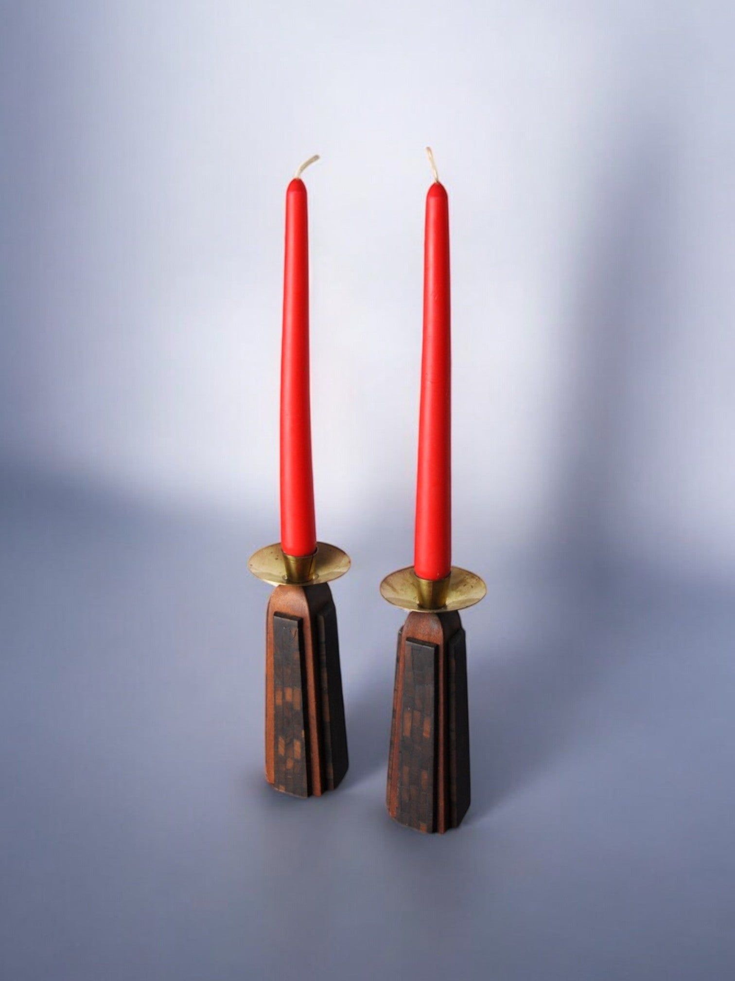 Pair of "David" Candle Holders 1960 — angled view with red candles