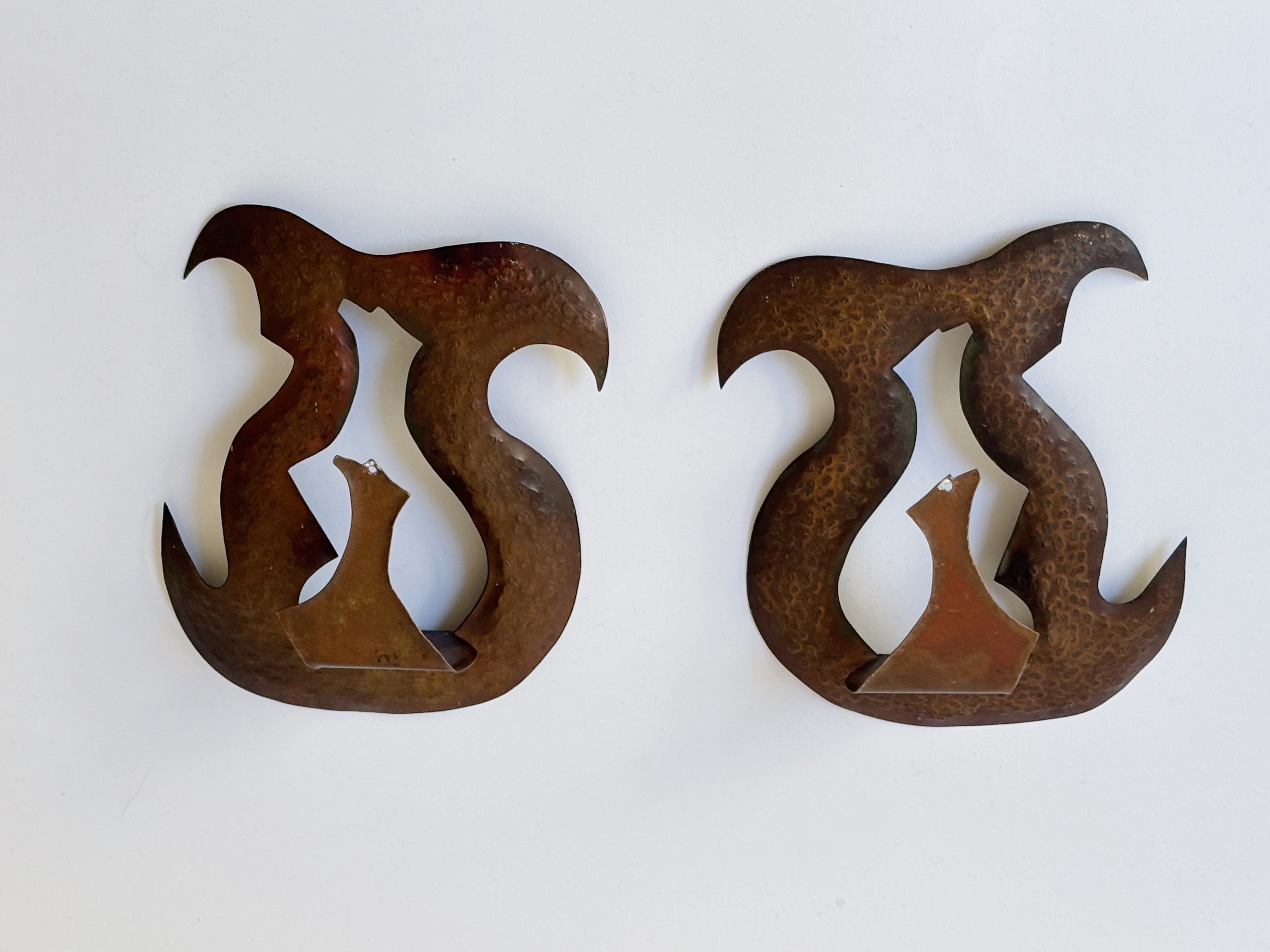 Pair of Torch Cut Metal Wall Candleholders, Poland — lifestyle setting