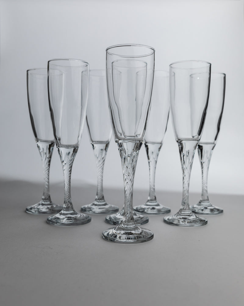 Set of 8 vintage 1980s champagne flutes with twisted crystal stems