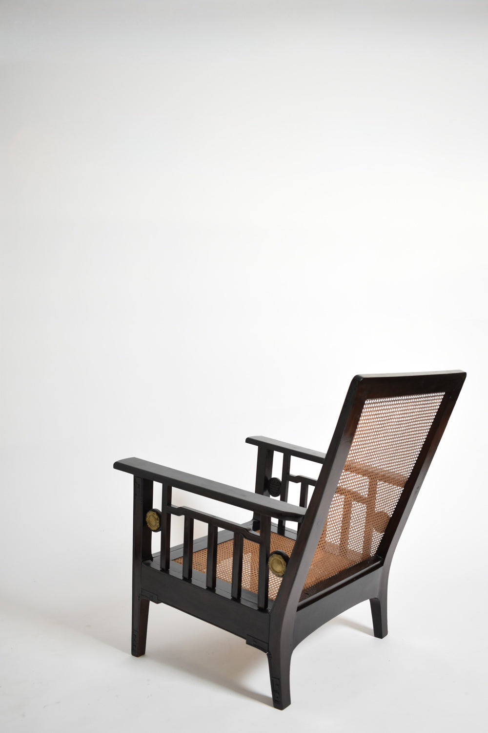 Pair of Colonial Ebonised Wood & Caning Armchairs, 1920s — side angle
