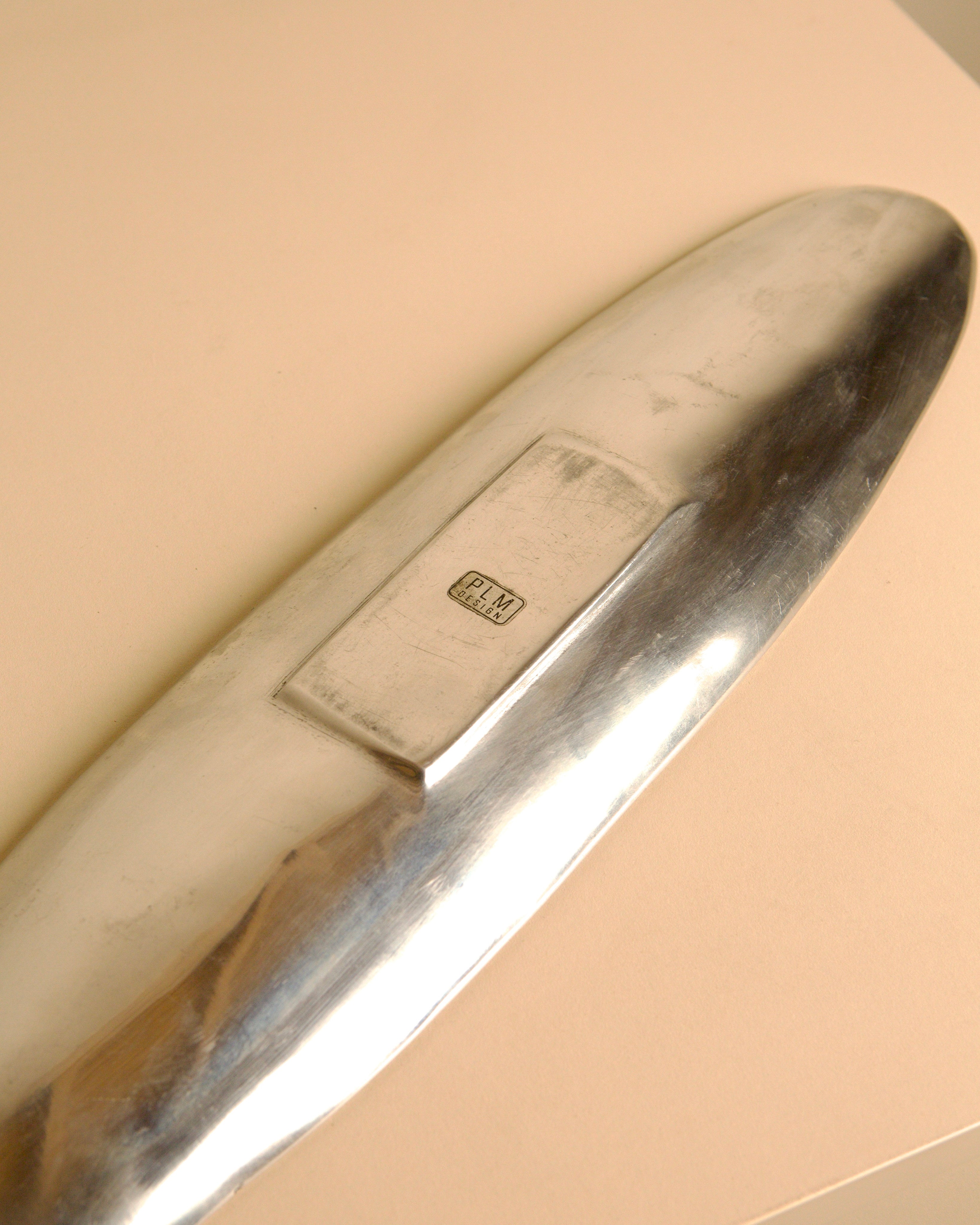 Large Italian Cast Aluminum Valet Tray by PLM Design, 1980s — top view showing polished surface and logo