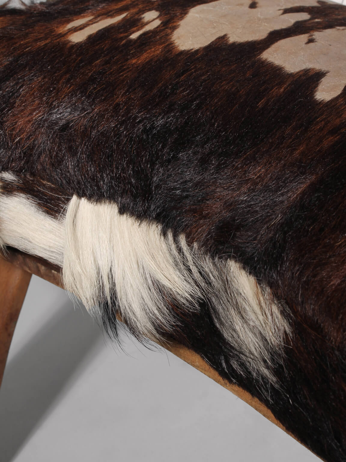 Cowhide Camel Saddle Stool — detail view