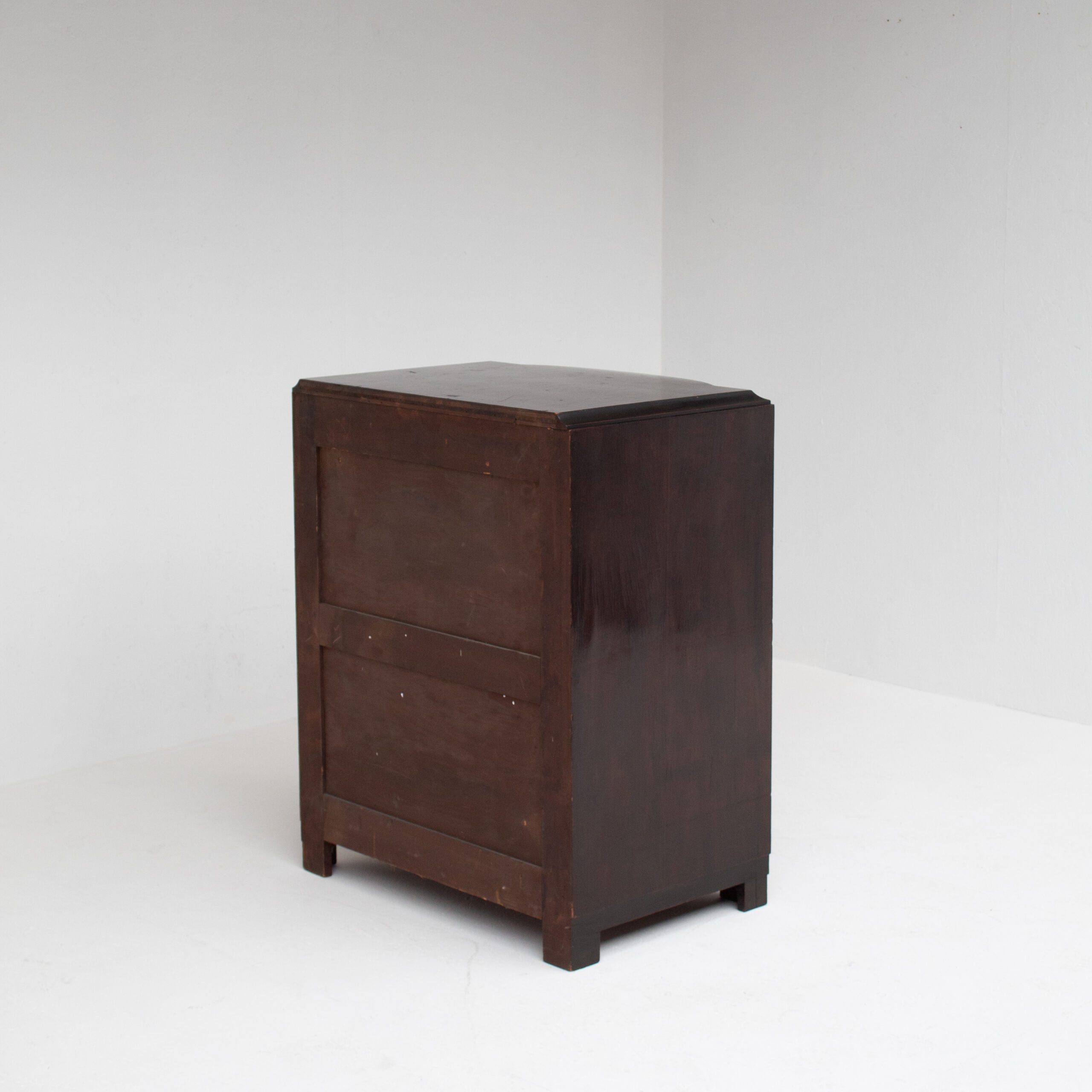 Art Deco Cabinets — back view of dark wood nightstand
