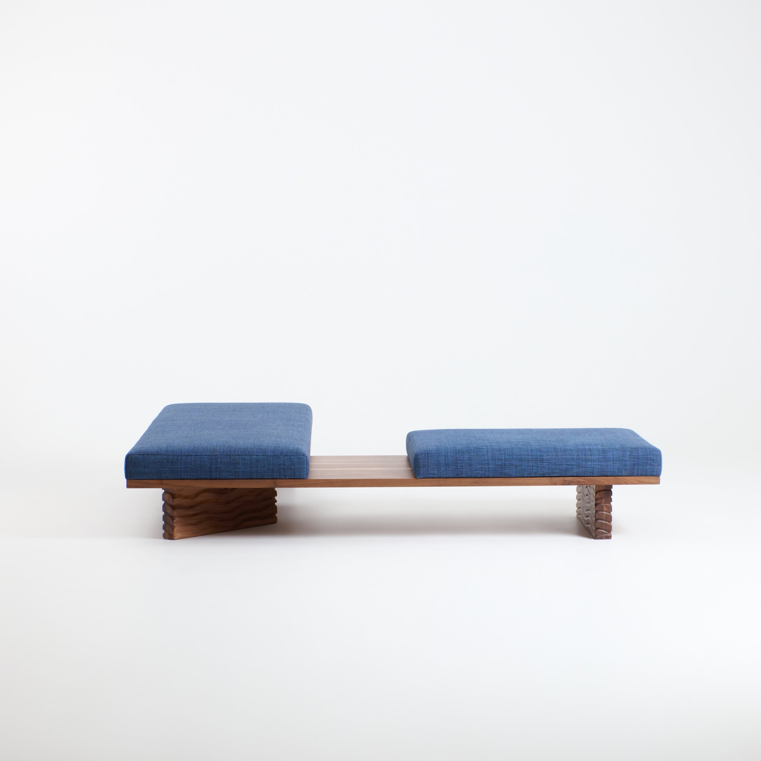 Nazaré Daybed L Shape — side view with blue fabric cushions