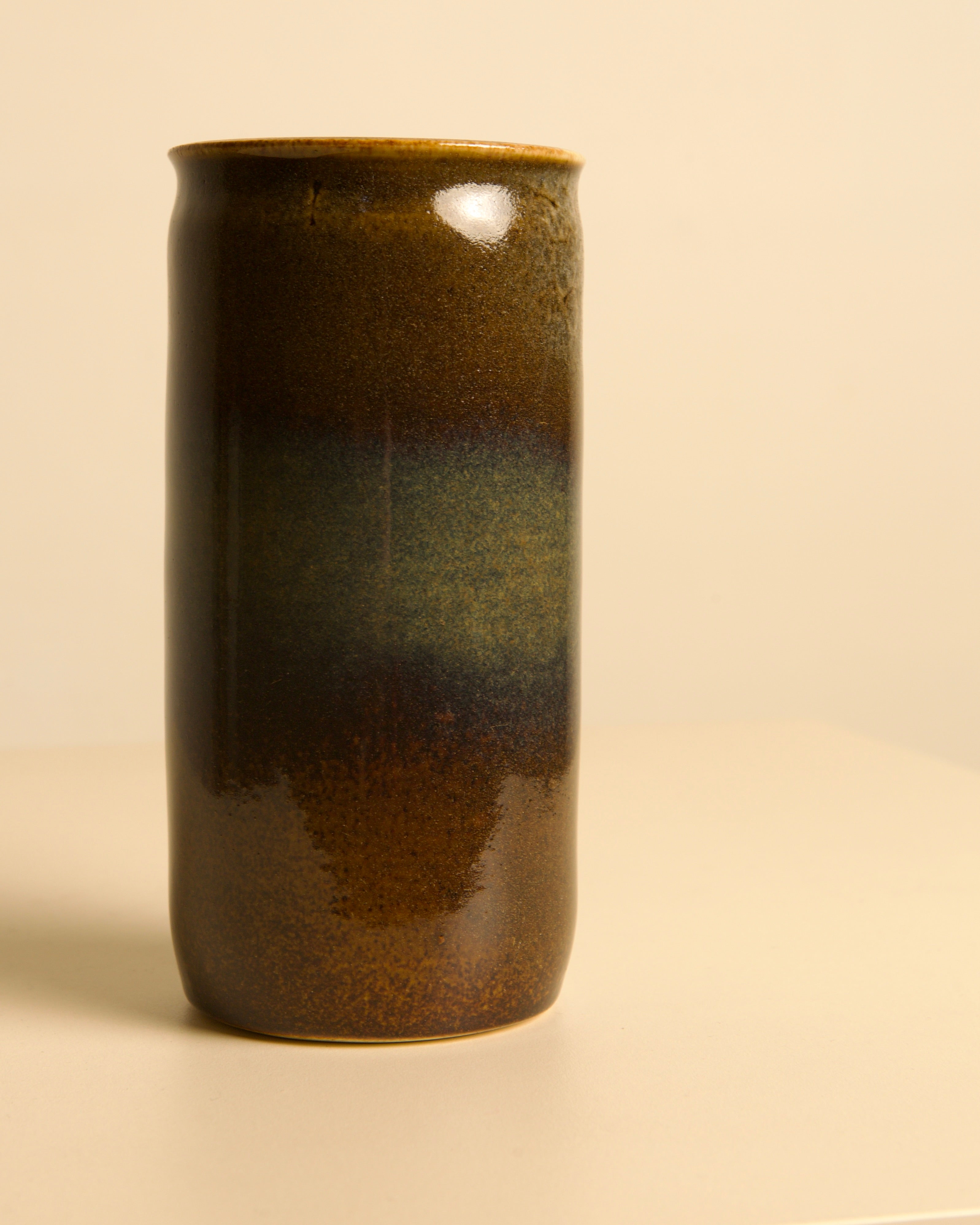 Cylindrical brown stoneware vase with gradient glaze by Rivillon